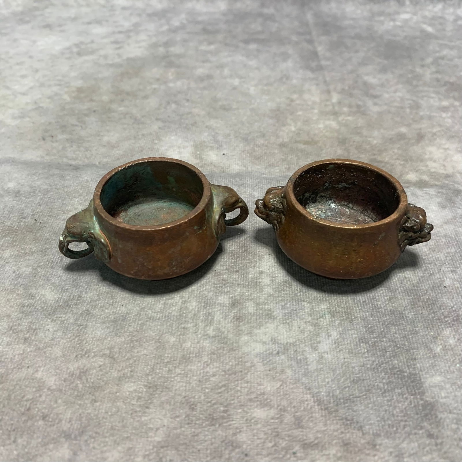 MING-STYLE “XUAN?? MARK LION-HANDLE BRONZE INCENSE BURNERS (PAIR): Ming Dynasty Style; H; 1.3 inch; Diameter: 2.8;3.1 inch