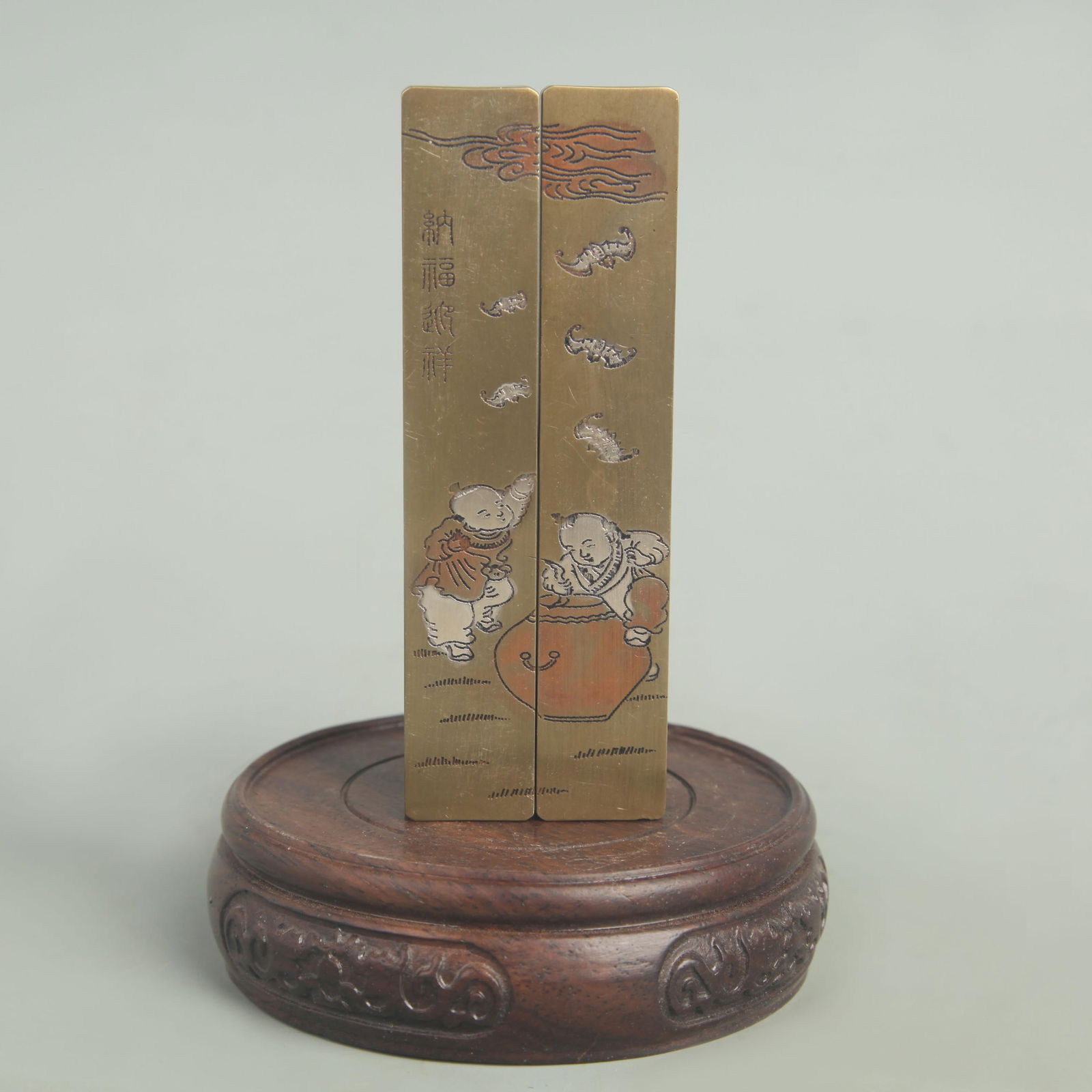 BRONZE AND SILVER INLAY NE ZHA NAO HAI FIGURE PAPER WEIGHT: Republic Period; High: 4.25 inch; Width: 0.75 inch;