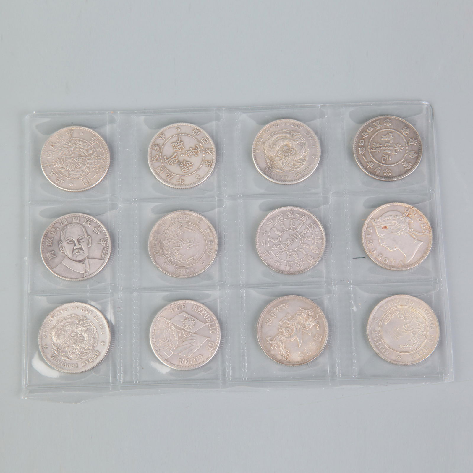 GROUP OF TWELVE OLD CHINESE COIN: Republic Period; Diameter: 1.0 inch