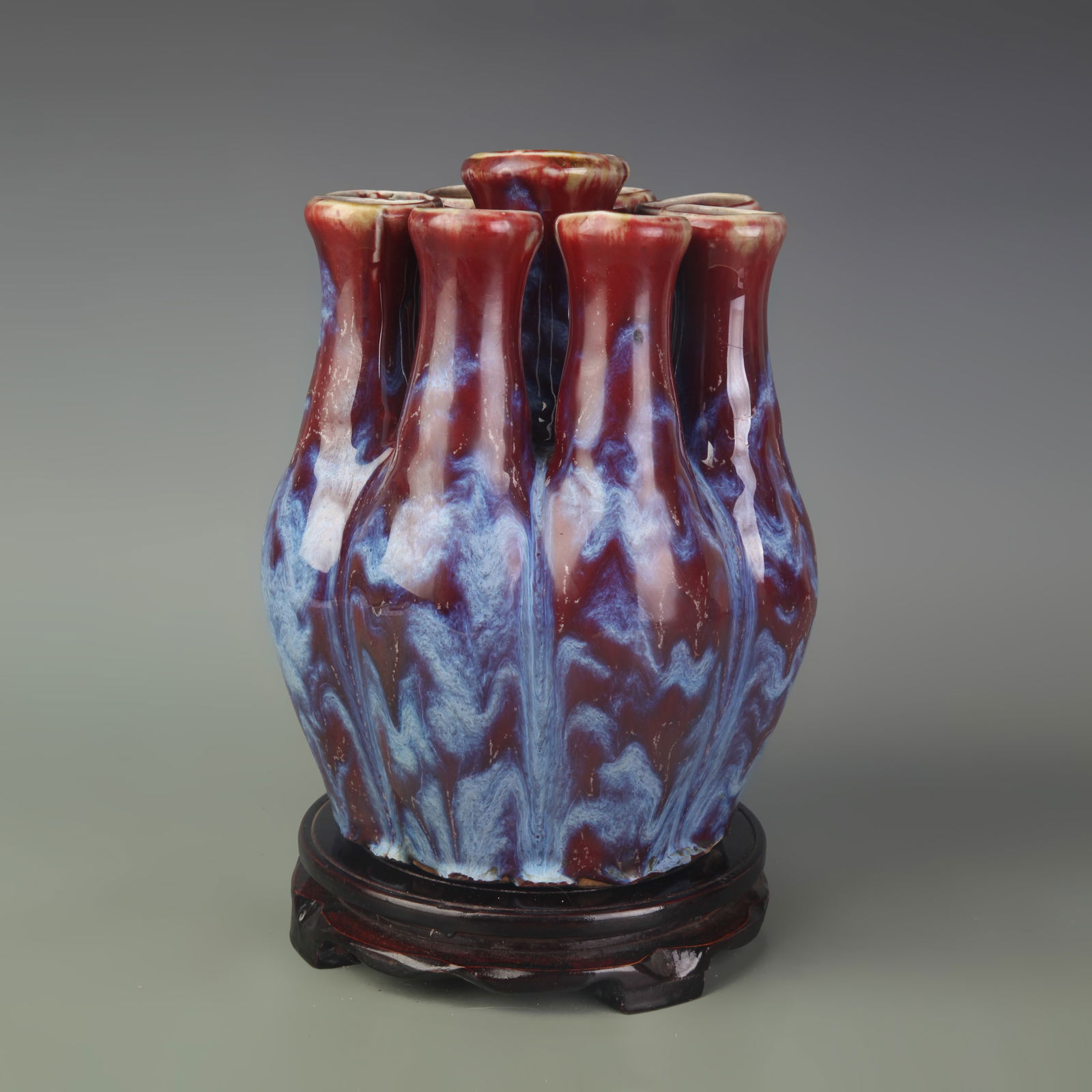 DARK RED KILN NINE-OPENING PORCELAIN VASE: Qing Dynasty; Width: 6.9 inch; High: 9.5 inch
