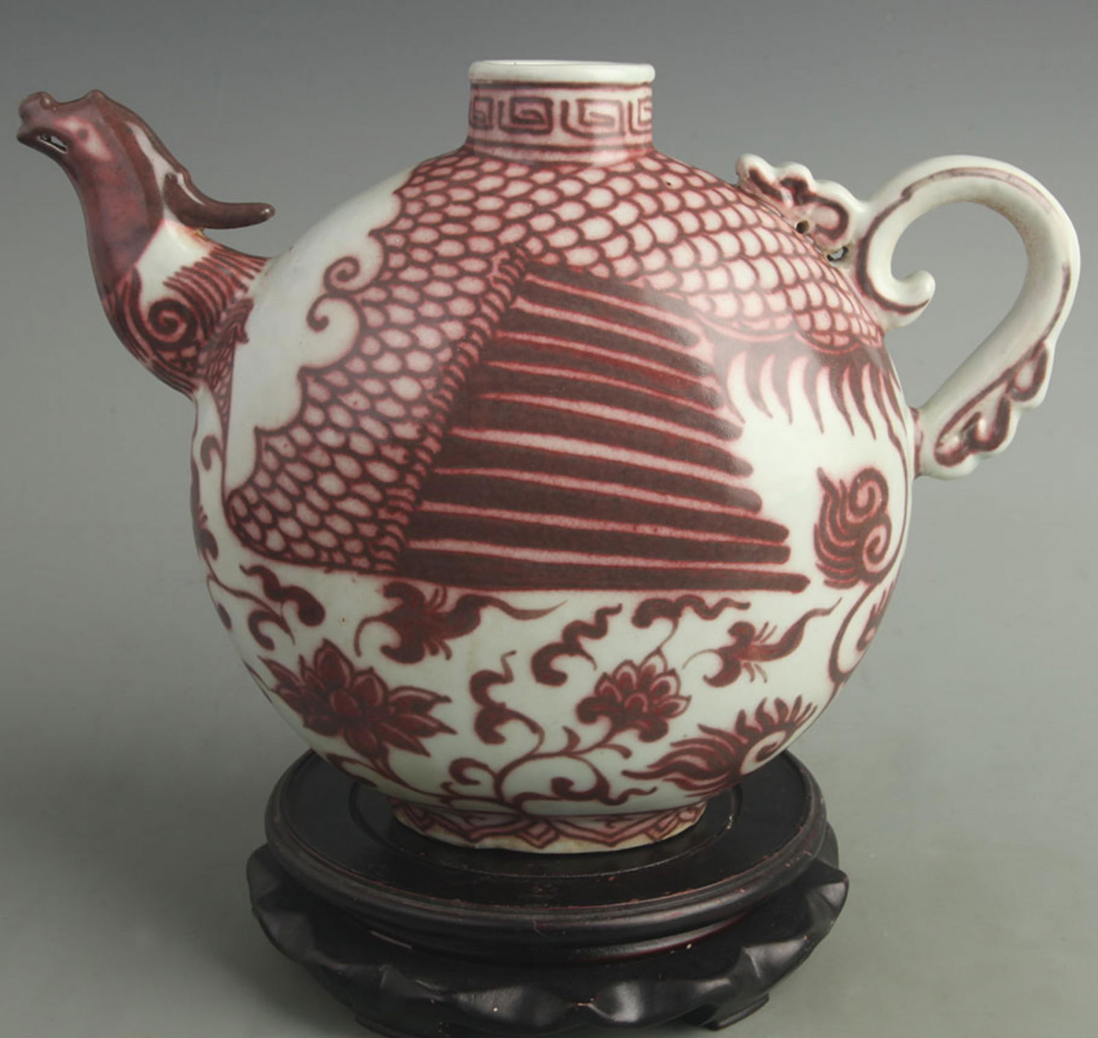 UNDERGLAZE-RED PHOENIX-PATTERN PORCELAIN EWER: Ming Dynasty Style; High: 9.50 inch; Diameter: 12.0 inch