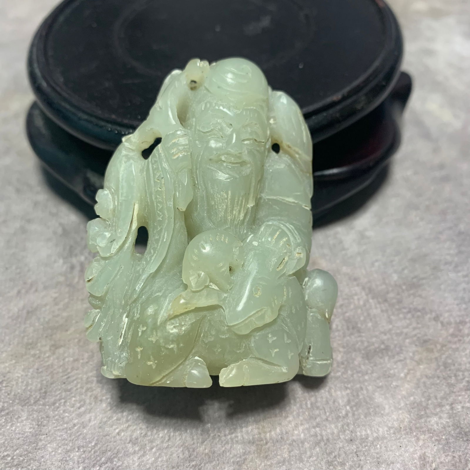 HETIAN GREENISH-WHITE JADE PENDANT OF LONGEVITY GOD: Qing Dynasty; Long: 2 inch; Width: 1.1 inch; High: 2.3 inch;