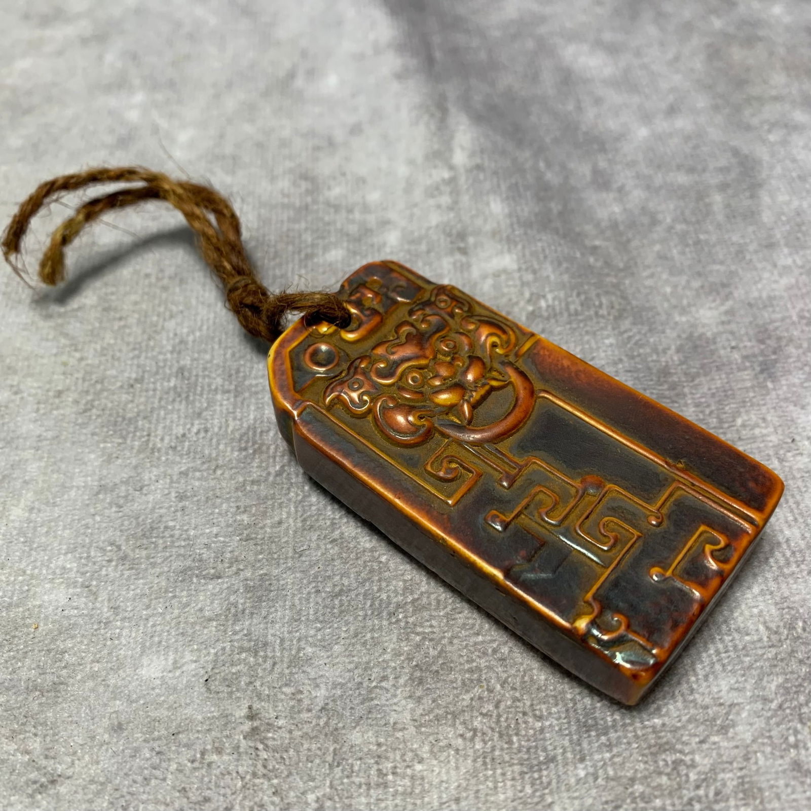 A FINE BONE PLAQUE WITH LION DESIGN - 2