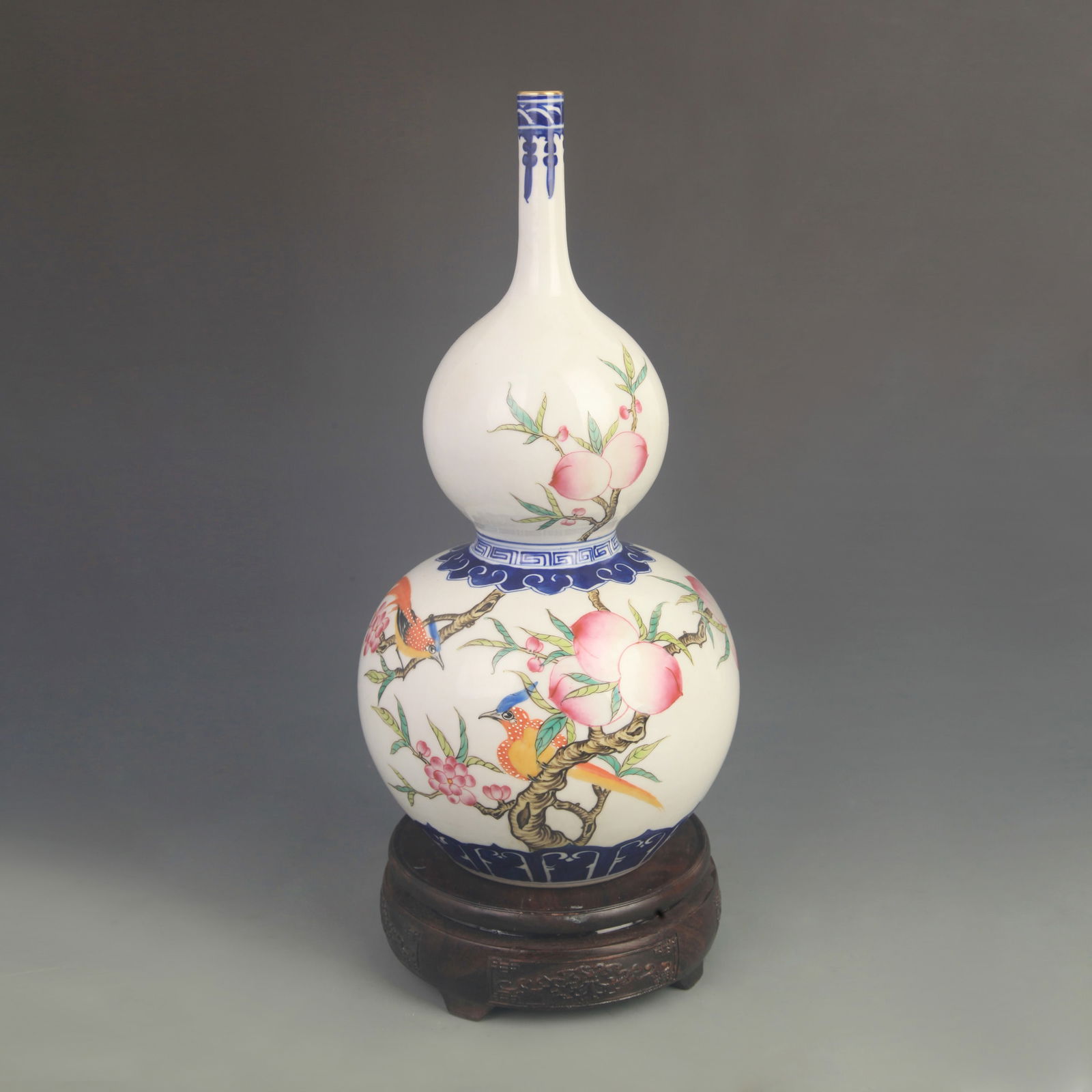 FAMILLE ROSE LONG-NECKED GOURD VASE WITH LONGEVITY PATTERN: Qing Dynasty; Qianlong Period; High: 12.0 inch; Diameter: 5.50 inch;