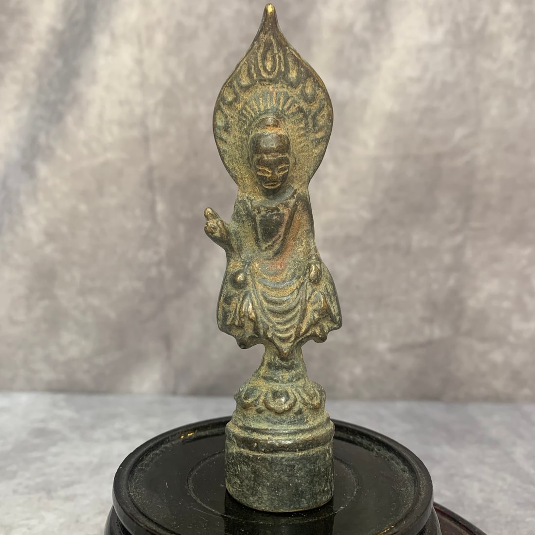 A FINE SMALL BRONZE TIBETAN BUDDHA STATUE: Qing Dynasty; High: 4.4 inch; Width: 1.2 inch