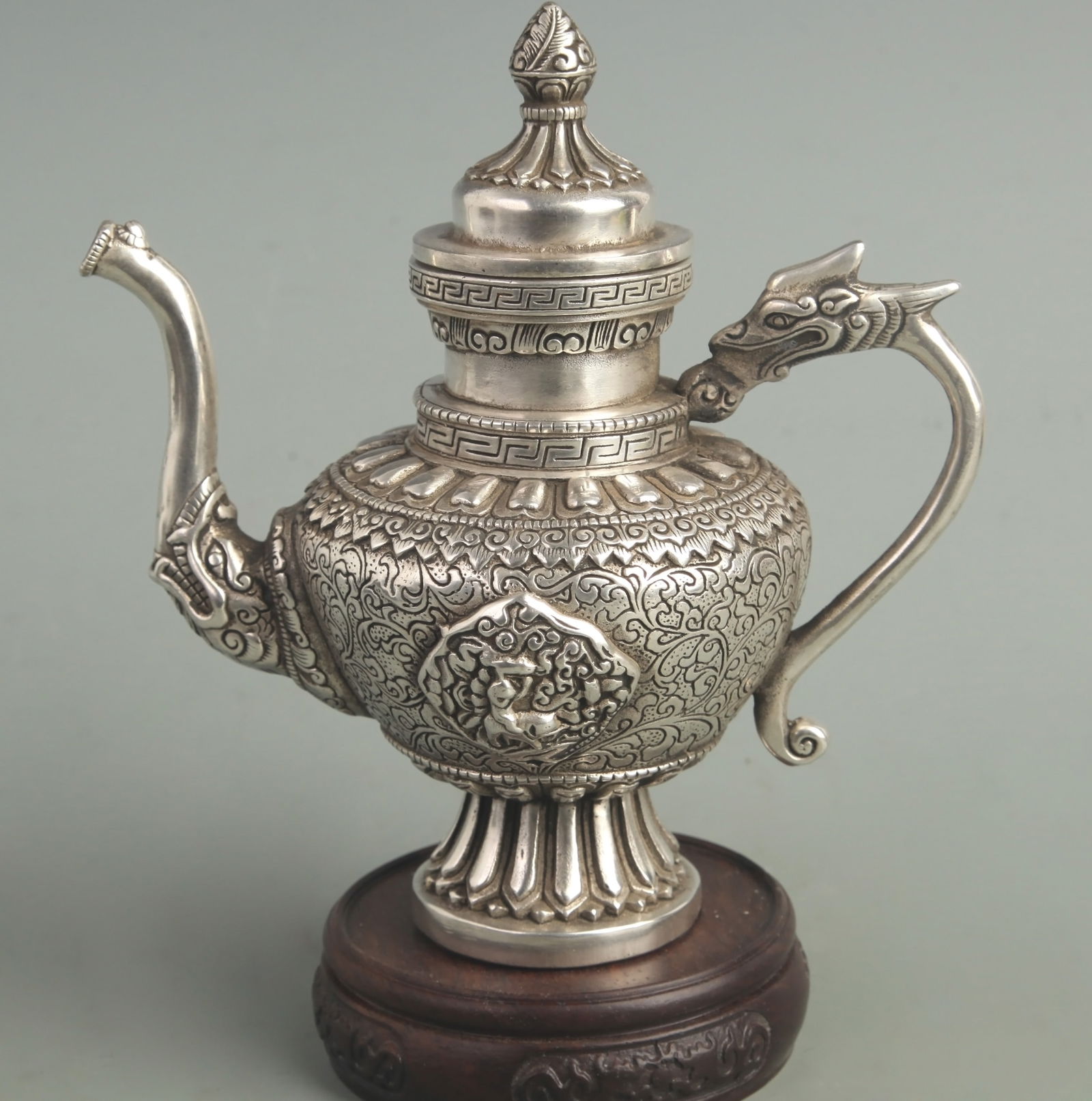 A FINE WHITE BRONZE FIGURE PATTERN TIBETAN EWER: Modern; High: 6.80 inch; Width: 6.50 inch; Diameter: 2.10 inch;