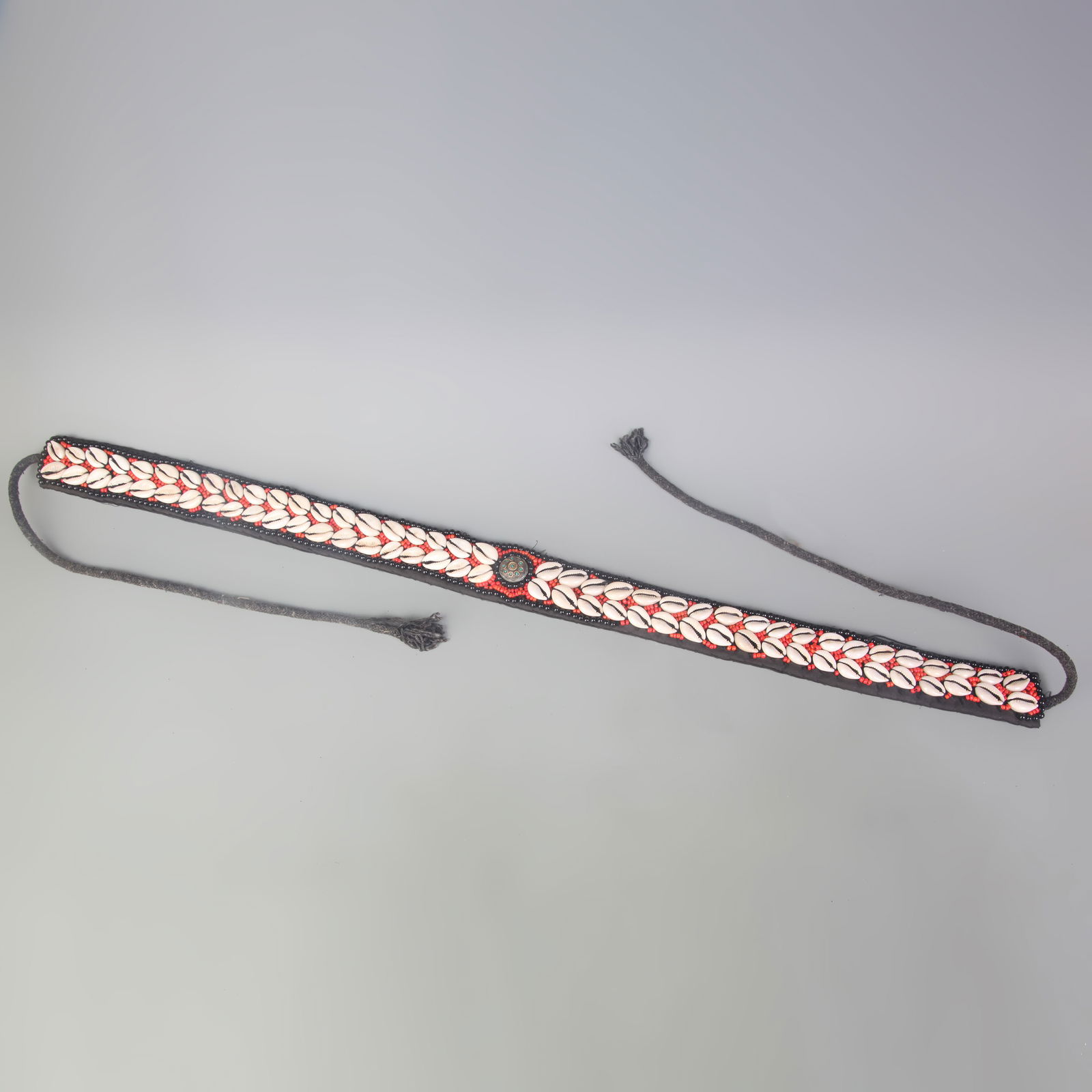 A FINE TIBETAN BUDDHIST BELT WITH RED CORAL AND SHELLS ACCESSORIES: Modern; Long: 28.0 inch;