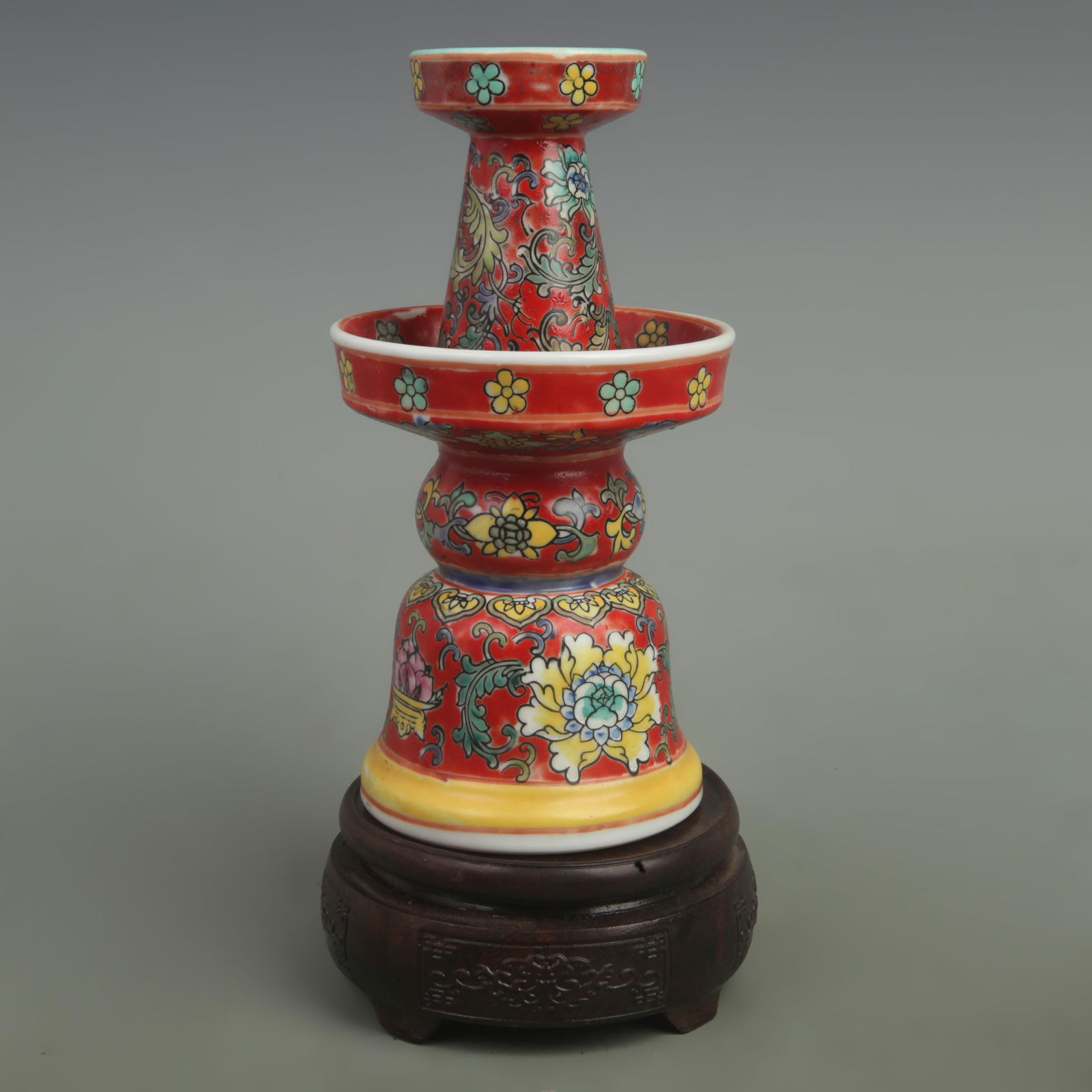FAMILLE ROSE RED COLOR GLAZED FLOWER PATTERN CANDLESTICKS: Qing Dynasty Qian Long Period Diameter:High: 8 inch; Width: 4.5 inch;