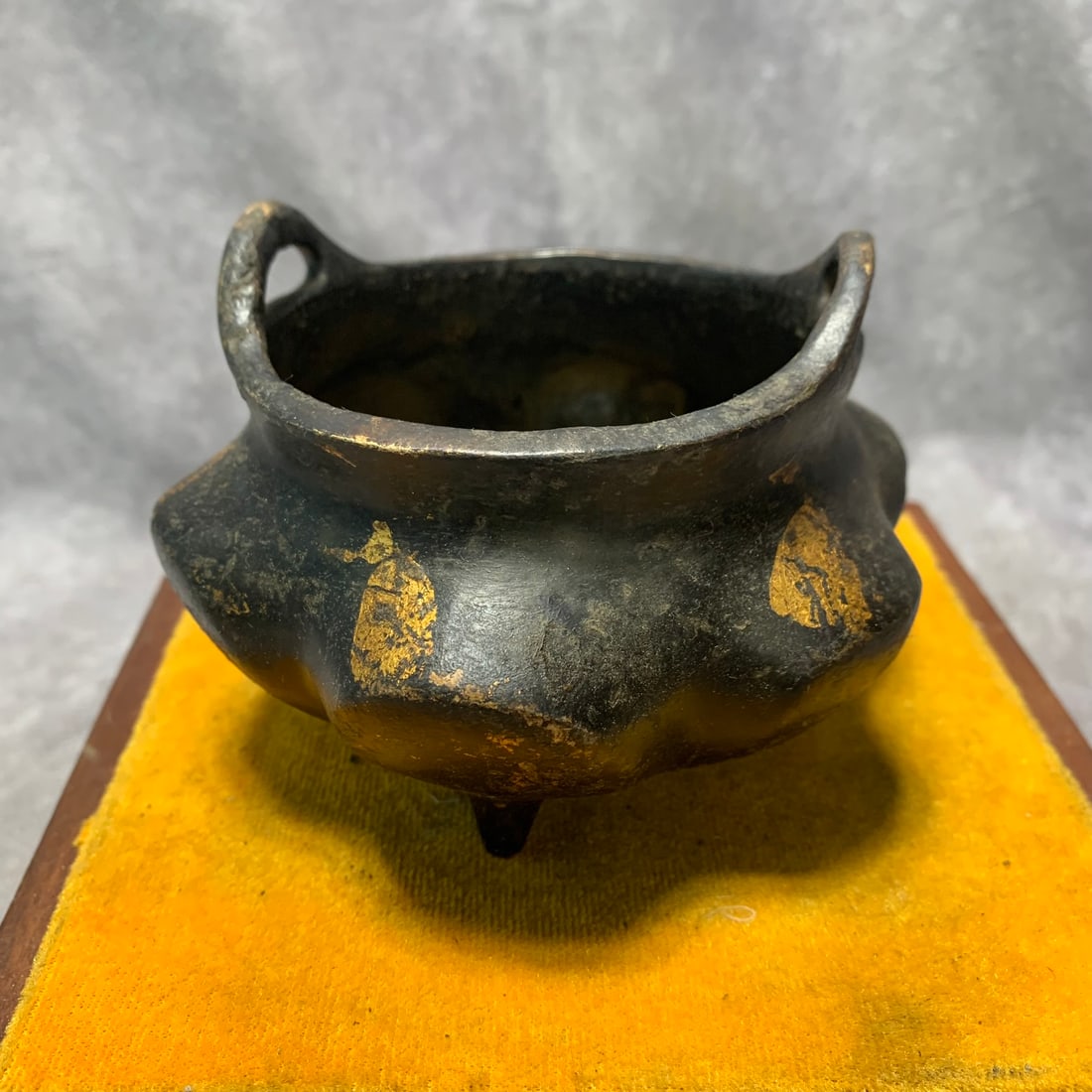 GILT BRONZE THREE-LEGGED EARED QUATREFOIL CENSER: Qing Dynasty; High: 2.2 inch; Diameter: 4.3 inch