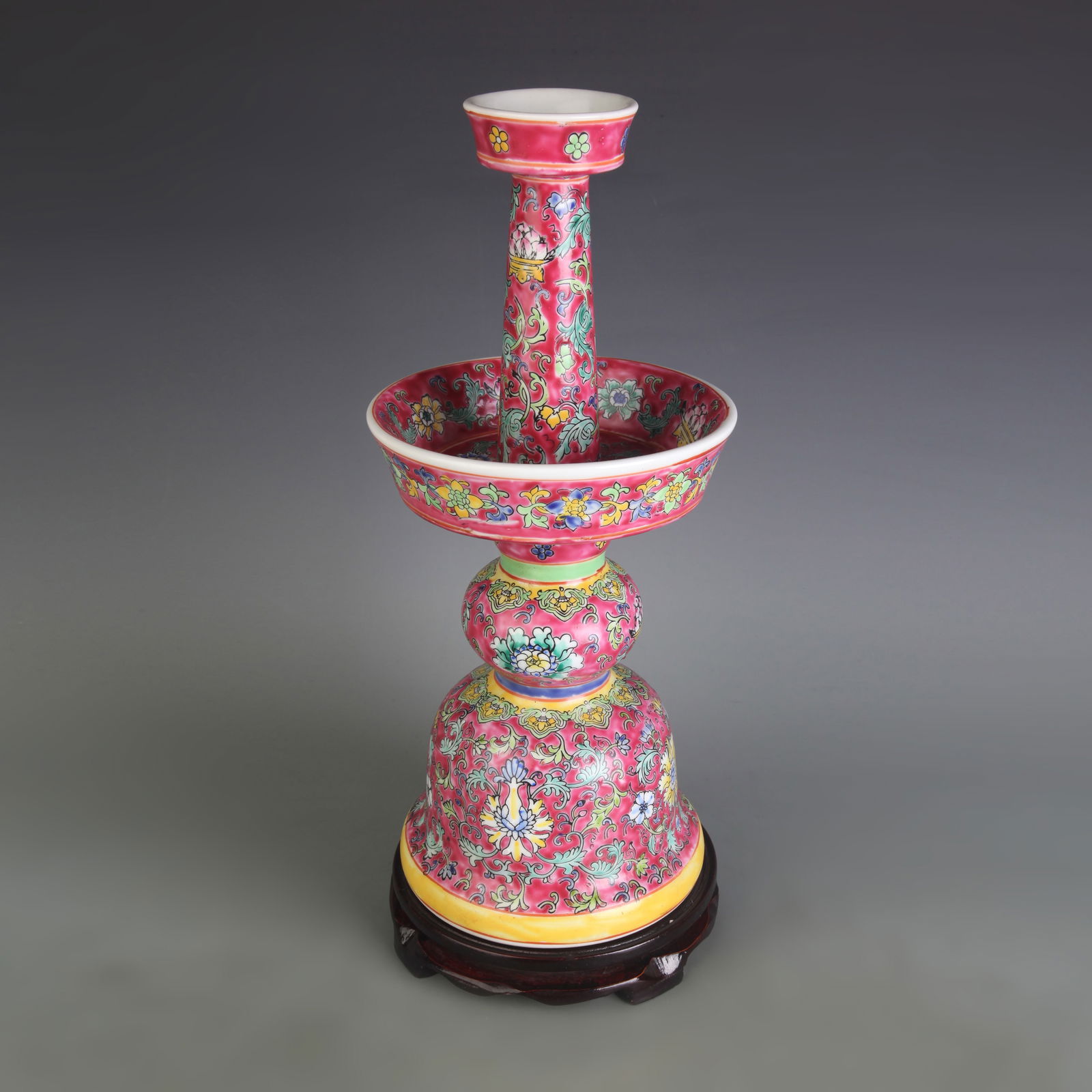 FAMILLE ROSE FLOWER-PATTERNED CANDLESTICK: Qing Dynasty Qian Long Period; Width: 6.5 inch; High: 15.1 inch;