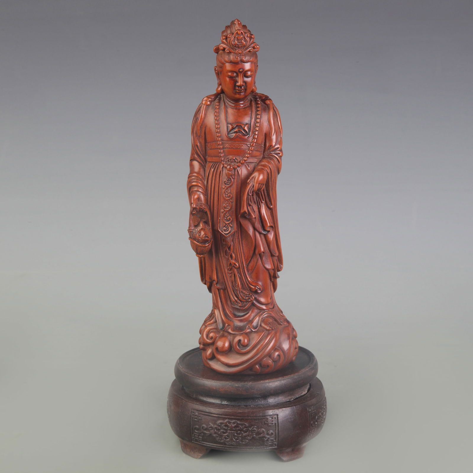 A FINE BOXWOOD GUAN YI FIGURE: Qing Dynasty; High: 8.1 inch;