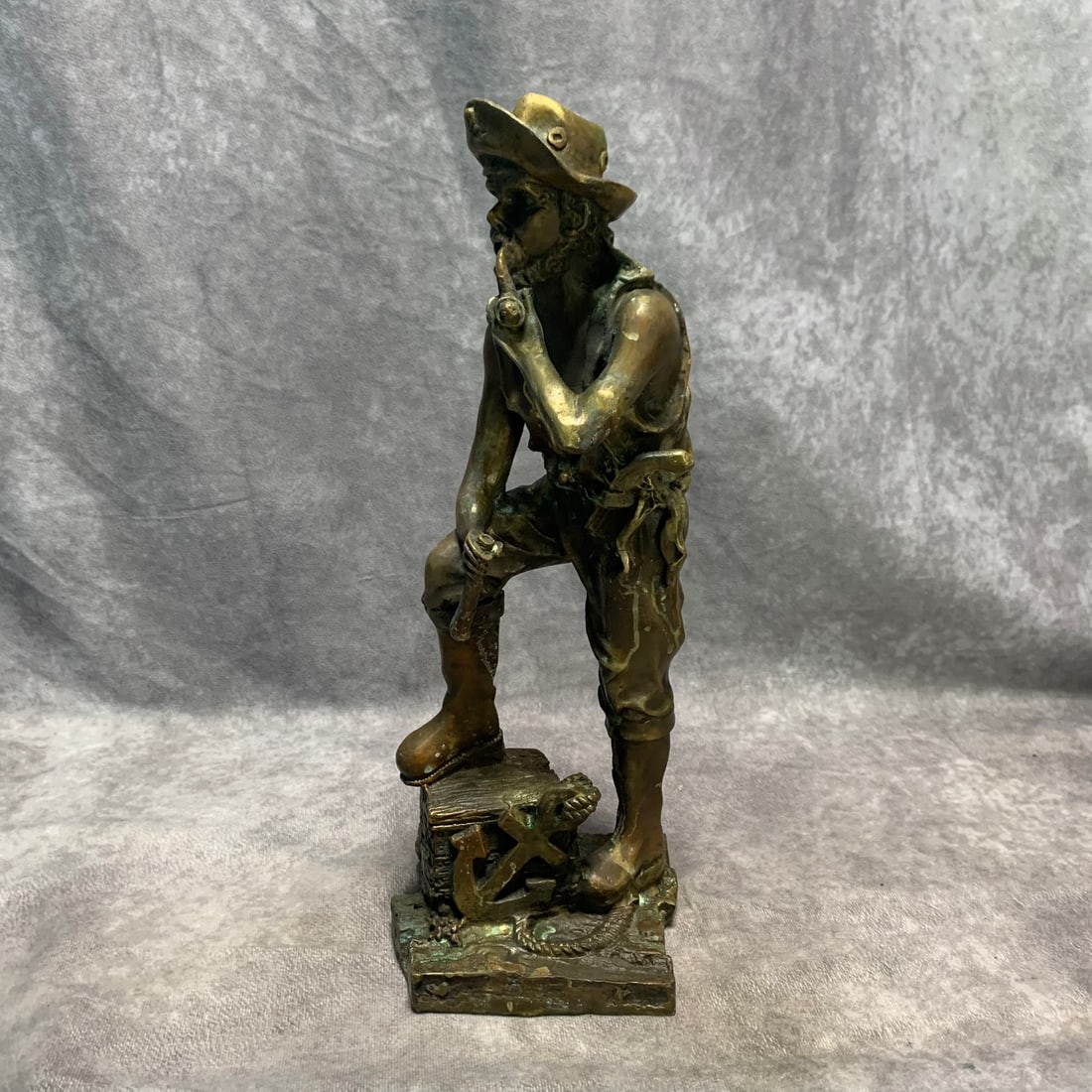 CONTEMPORARY BRONZE SAILOR ORNAMENT: Modern; Long: 5 inch; Width: 4.6 inch; High: 13.6 inch;
