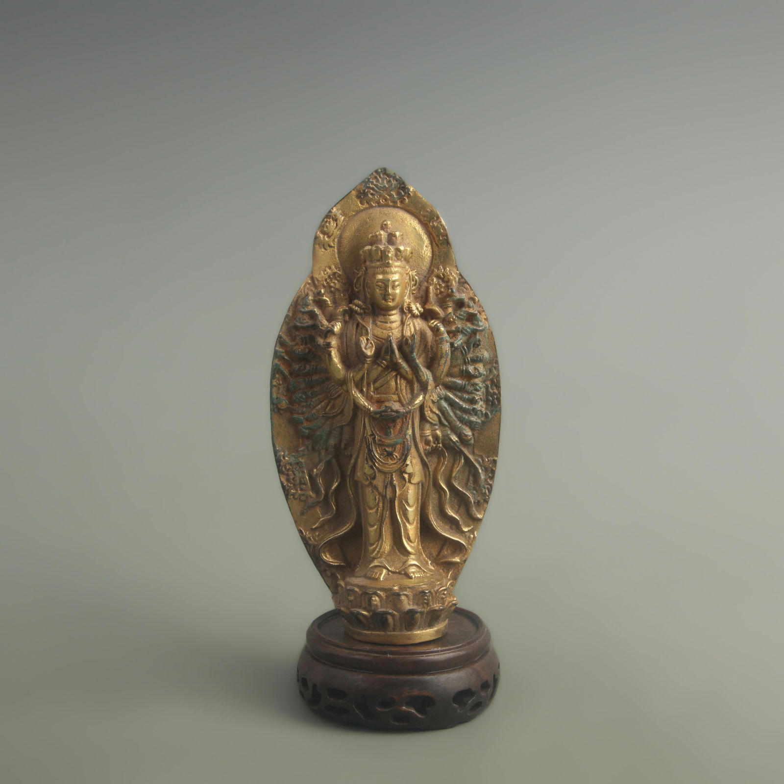 GILT BRONZE THOUSAND-ARMED GUANYIN: 20h Century; High: 5.90 inch; Diameter: 1.40 inch