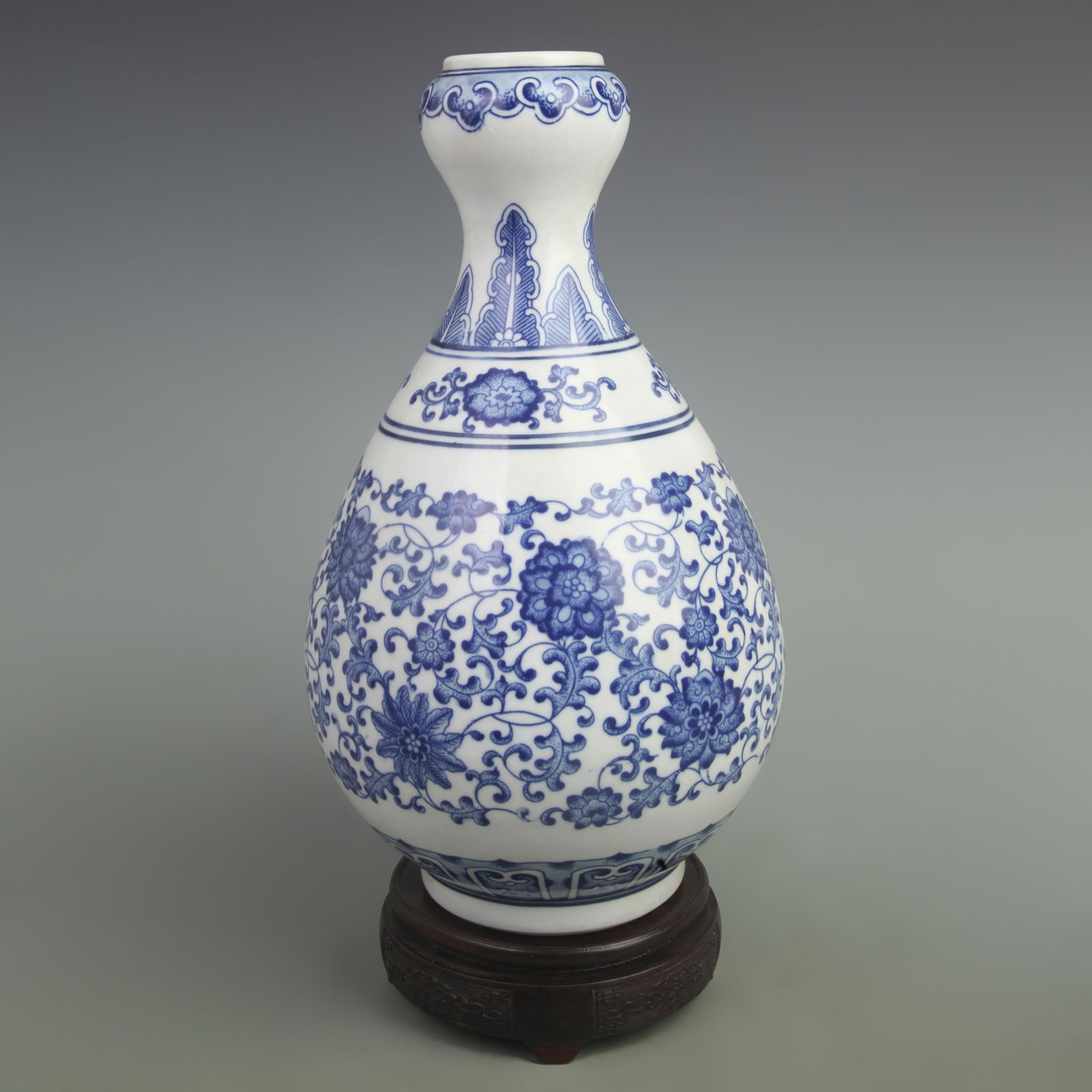 BLUE AND WHITE VASE WITH LOTUS PATTERN AND GARLIC HEAD BOTTLE: Qing Dynasty Yong Zheng Period; High: 13.5 inch; Width: 8 inch;