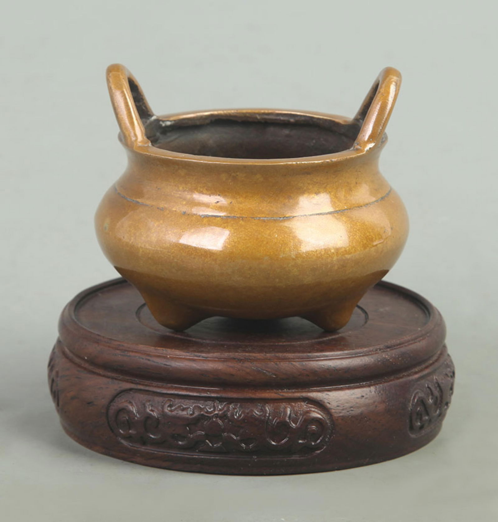 BRIDGE-EAR THREE-LEGGED BRONZE CENSER: Qing Dynasty Qian Long Period; High: 2.50 inch; Diameter: 2.80 inch