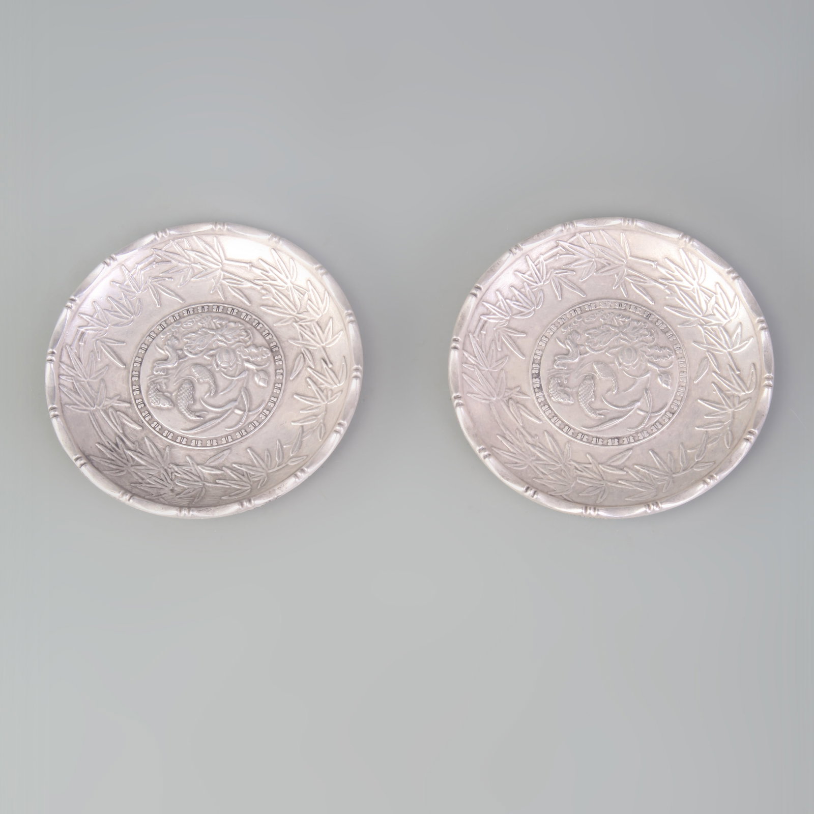 PAIR OF SILVER-PLATED SMALL PLATES: Republic Period; Diameter: 3.6 inch;