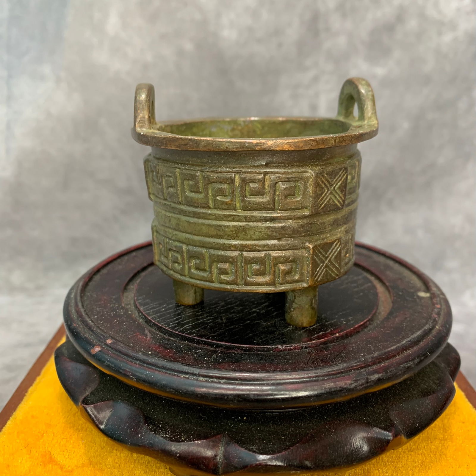 A SMALL BRONZE MADE CARVED CENSER: Modern; High: 2.5 inch; Diameter: 2.6 inch