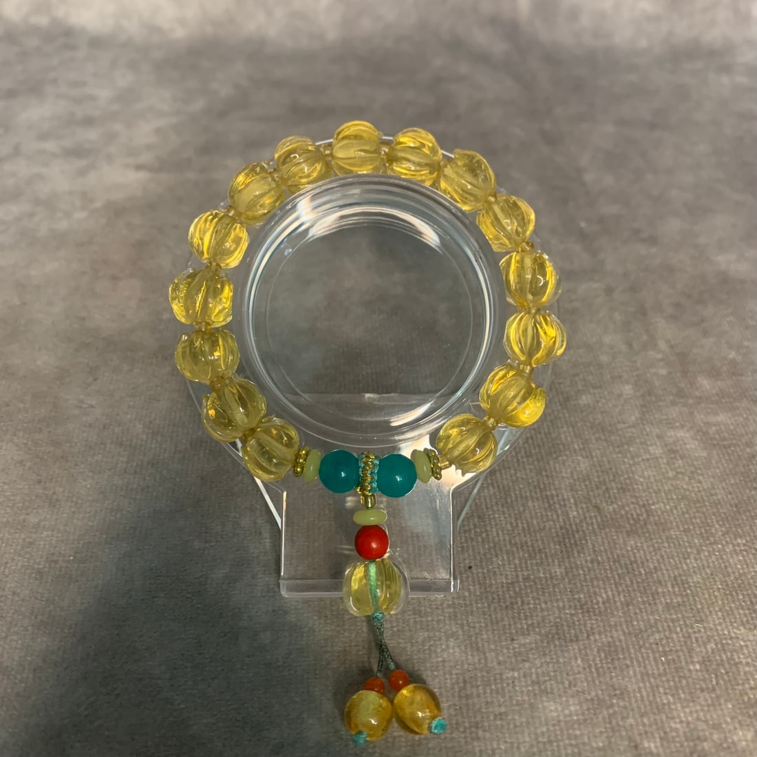 A FINE YELLOW GALSS MADE BRACELECT: Modern: Diameter: 2 inch; Each Bead Diameter:0.4 inch