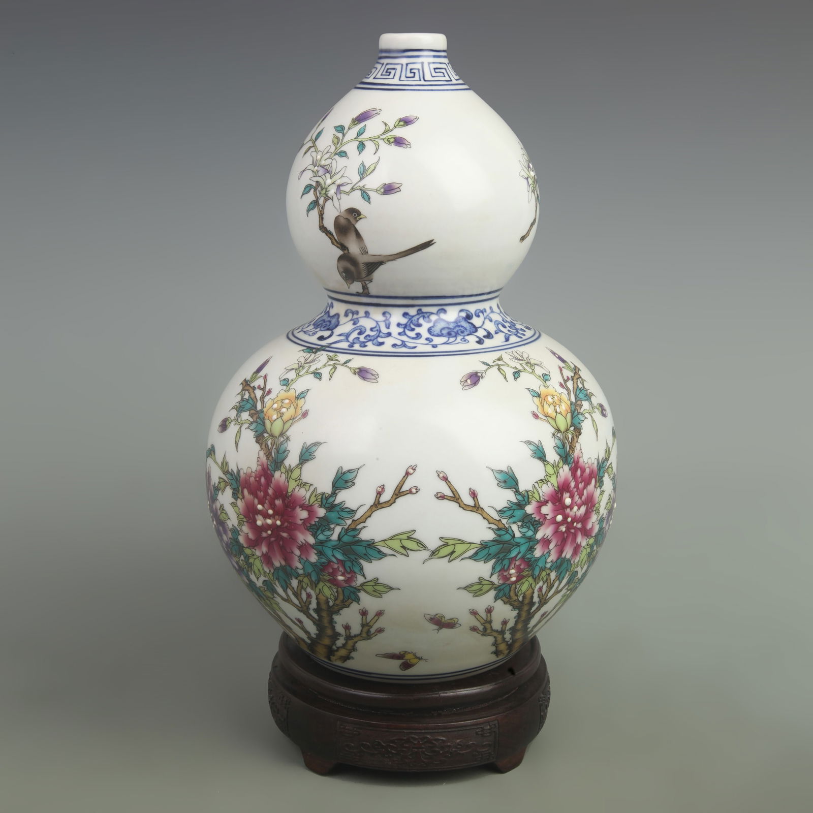 FAMILLE ROSE BLUE GROUND PEONY FLOWER GOURD PORCELAIN VASE: Qing Dynasty Yong Zheng Period; High: 12.5 inch; Width: 8.5 inch