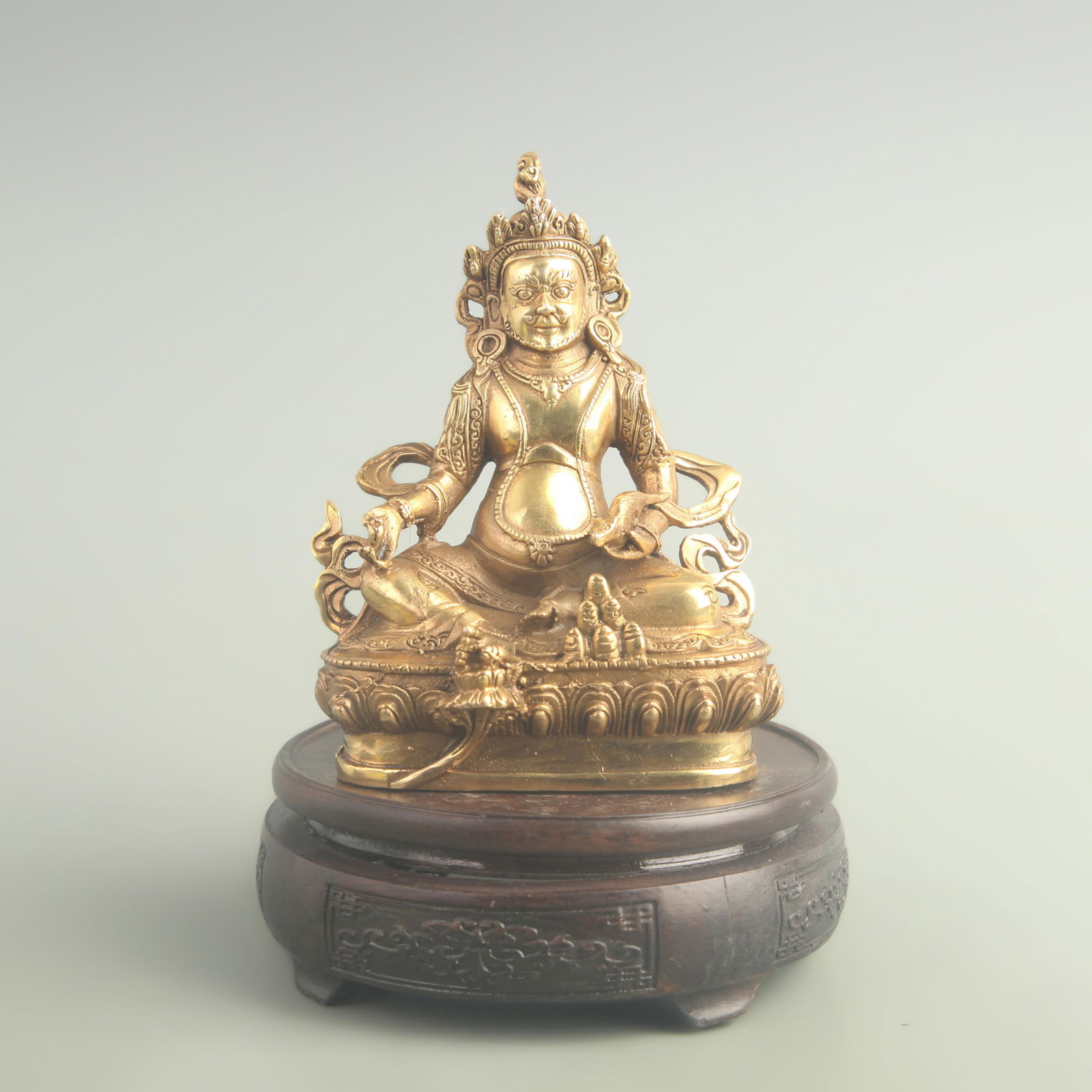 GILT BRONZE TIBETAN BUDDHIST WEALTH DEITY: 20th Century; High: 5.80 inch; Width: 2.00 inch; Long: 4.00 inch;