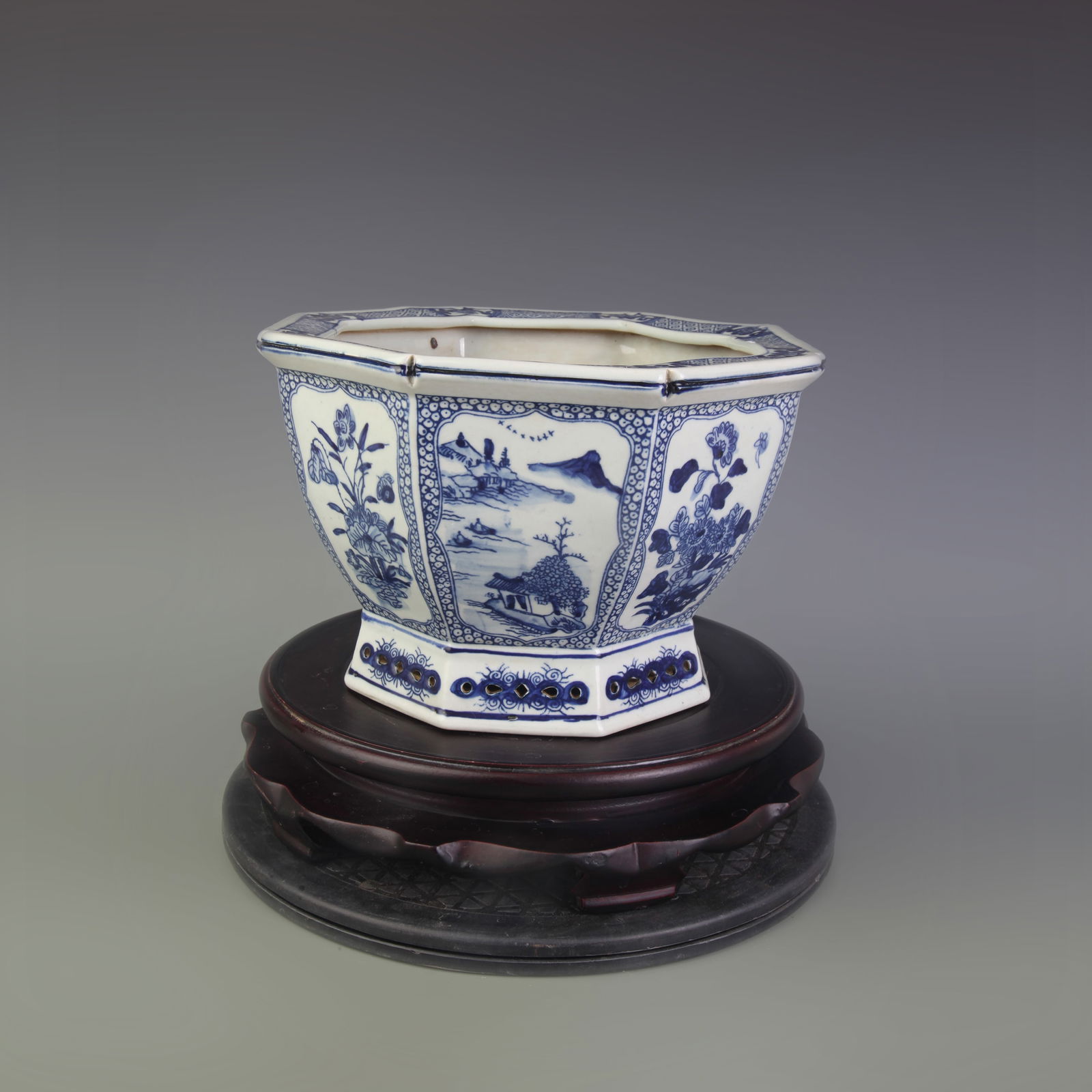 BLUE-AND-WHITE OCTAGONAL FLOWERPOT WITH FLORAL PANELS: Qing Dynasty; Width:10.5 inch; High:6.7 inch