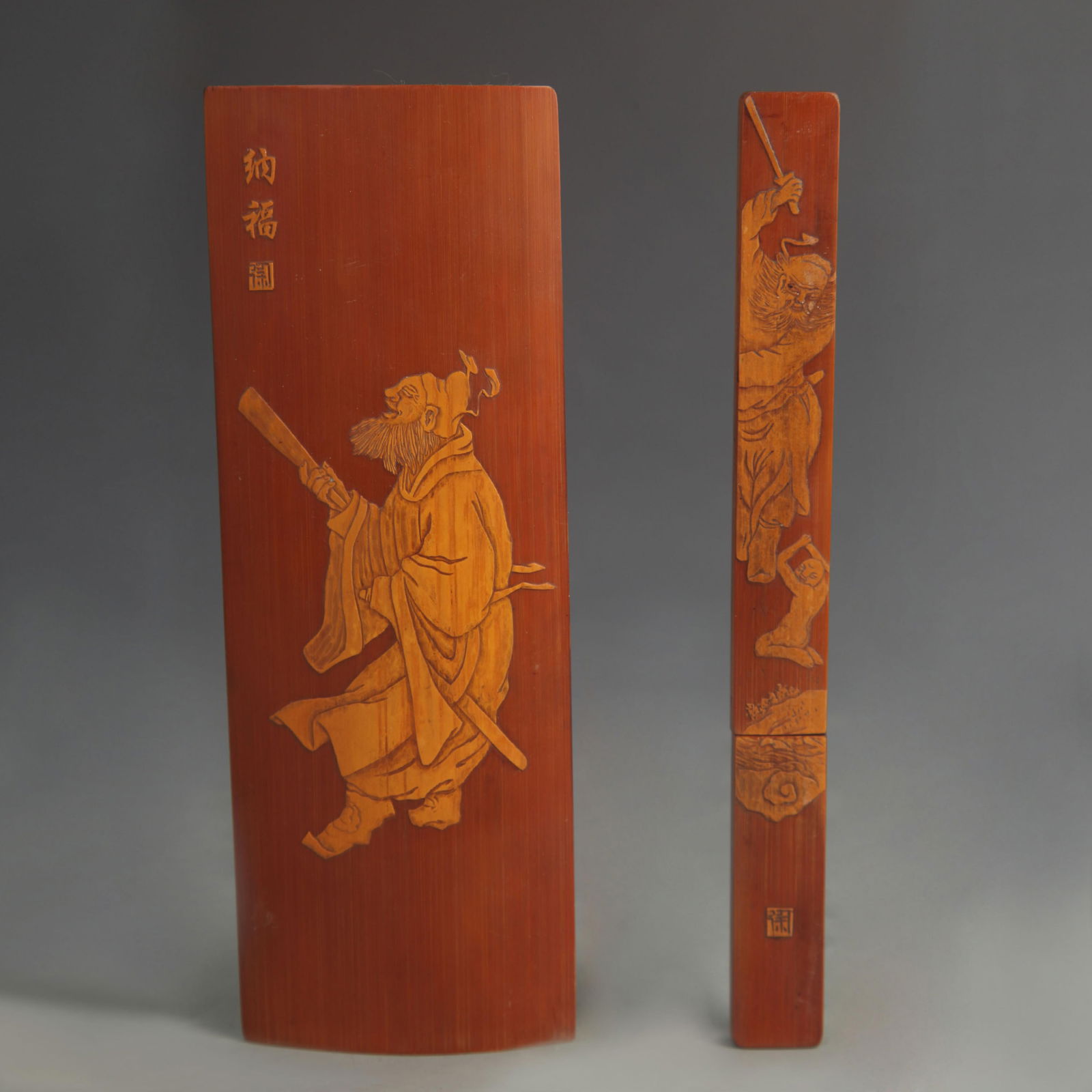 BAMBOO ARMREST WITH "BODHIDHARMA CROSSING THE RIVER" DESIGN AND PAPER KNIFE SET: 20th Century; Long: 7.00 inch; Width: 0.75 to 2.50 inch