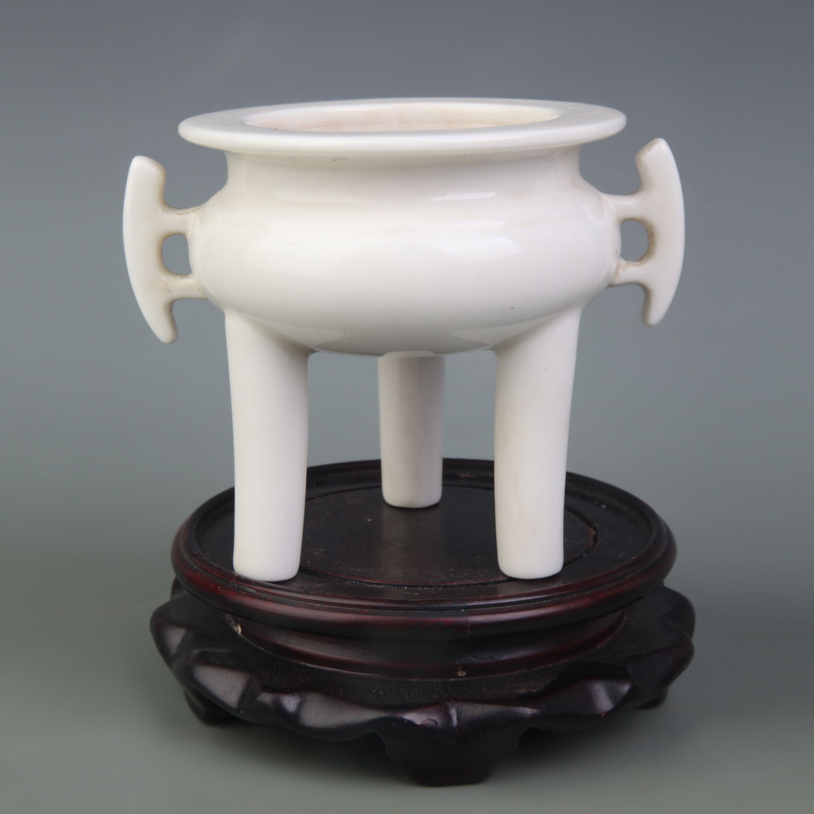 DEHUA WHITE PORCELAIN DOUBLE-EARED HIGH-FOOTED INCENSE BURNER: Qing Dynasty; Diameter: 4.0 inch; High: 4.0 inch
