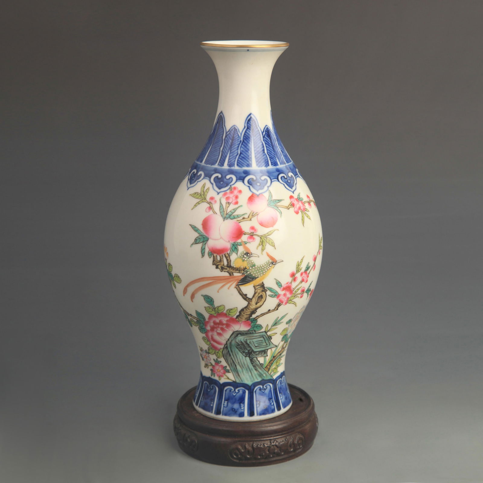 ENAMEL COLORED GUANYIN STYLE PORCELAIN VASE WITH FLORAL AND BIRD PATTERN: Qing Dynasty Qian Long Period; High: 9.80 inch; Diameter: 4.00 inch;