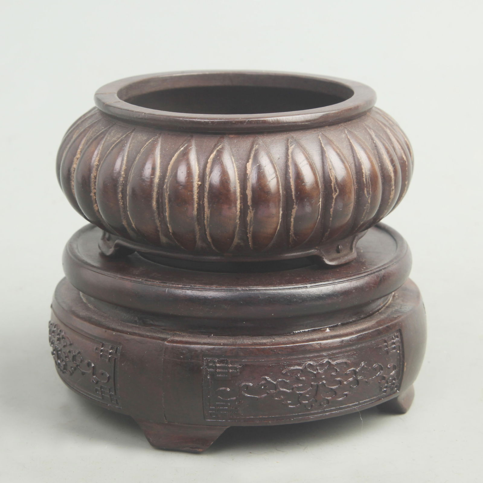 A FINE SANDALWOOD THREE-FOOTED WOODEN CENSER: Qing Dynasty; High: 6.5 inch; Diameter: 2.6 inch;