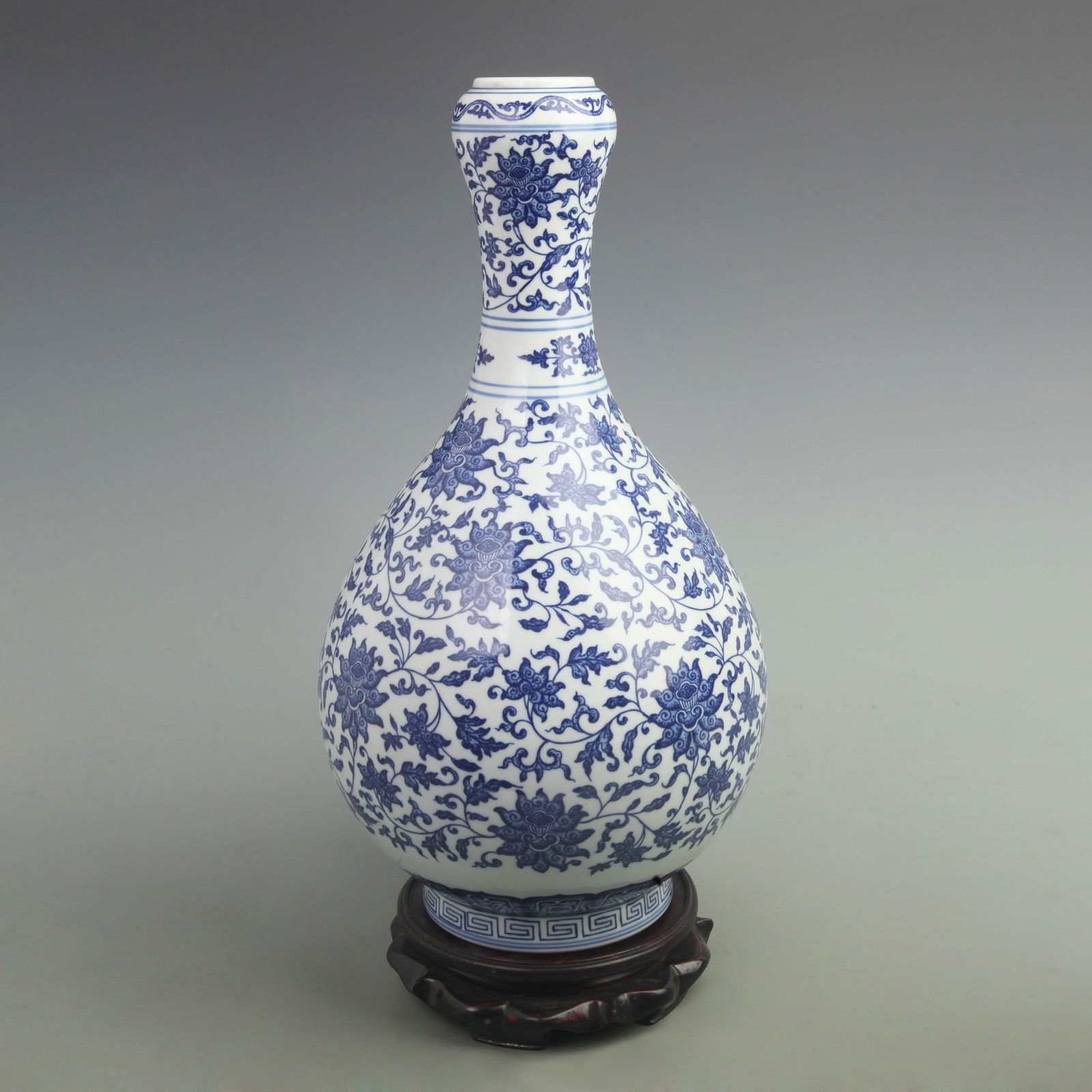 BLUE-AND-WHITE ENTWINED LOTUS GARLIC-HEAD PORCELAIN VASE: Qing Dynasty Qian Long Period, High: 16.3 inch; Width:8 inch;