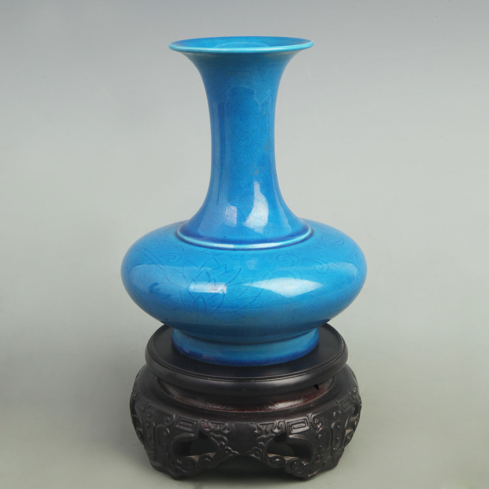 PEACOCK BLUE VASE WITH FLATTENED BELLY SHAPE PORCELAIN VASE: Ming Dynasty Style, High: 8.5 inch; Width: 6.5 inch;