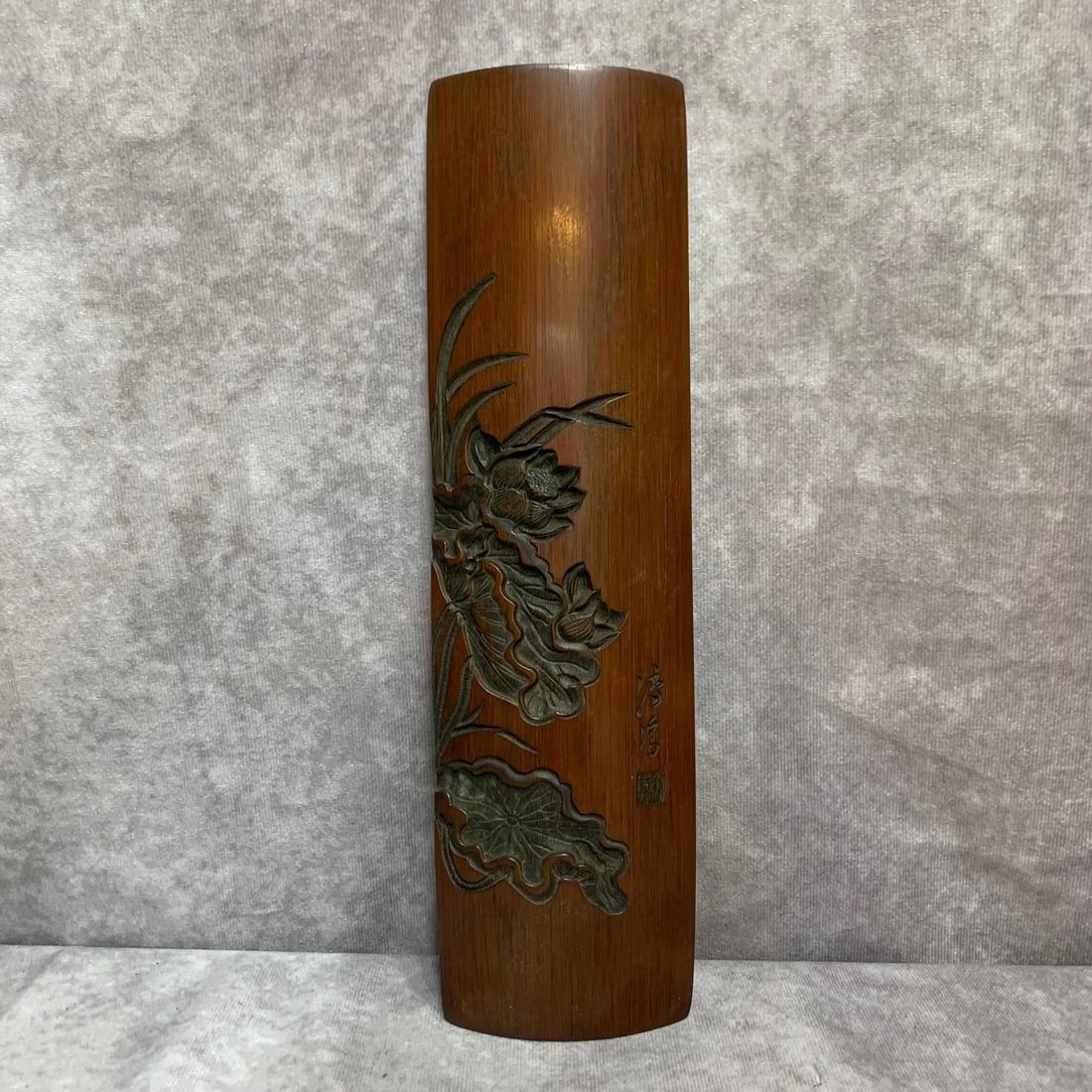 A FINELY CARVED BAMBOO MADE ARMREST: 20th Century; High: 11.0 inch; Diameter: 3.0 inch