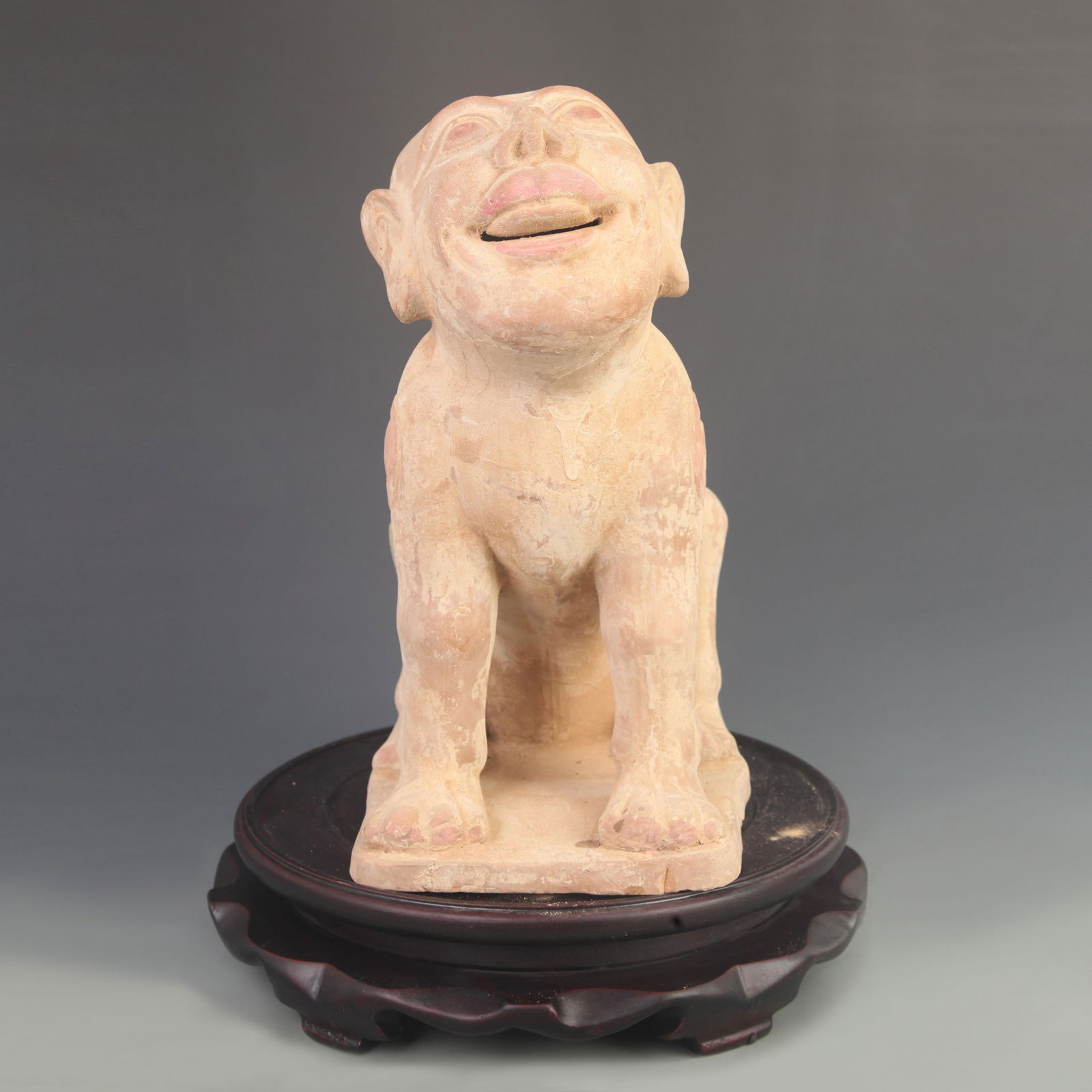 A HANG DYNASTY STYLE HUMAN-FACED GRAVE-GUARDING BEAST: Han Dynasty Style; High: 12.0 inch; Width: 5.00 inch; Long: 9.00 inch;