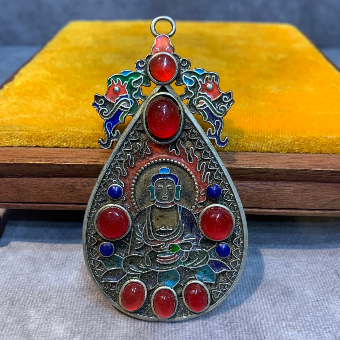 A FINE WHITE BRONZE AND GEM STONE PENDANT: Modern; High: 3.7 inch; Width: 2.0 inch