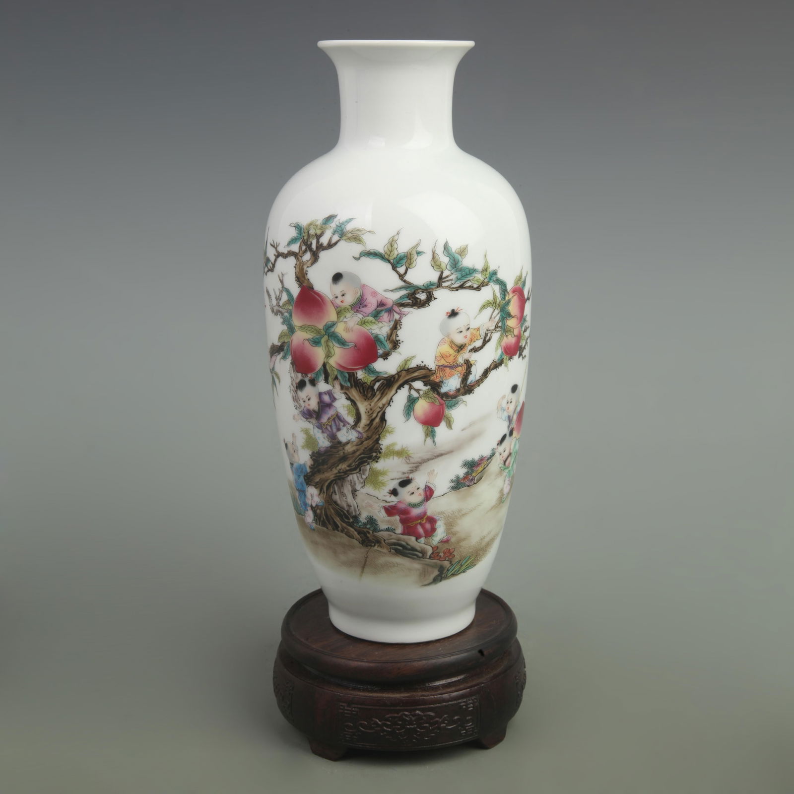 FAMILLE-ROSE "NINE BOYS CLIMBING PEACH" WINTER MELON STYLE PORCELAIN VASE: Qing Dynasty Qian Long Period; High: 10 inch; Width: 5 inch;
