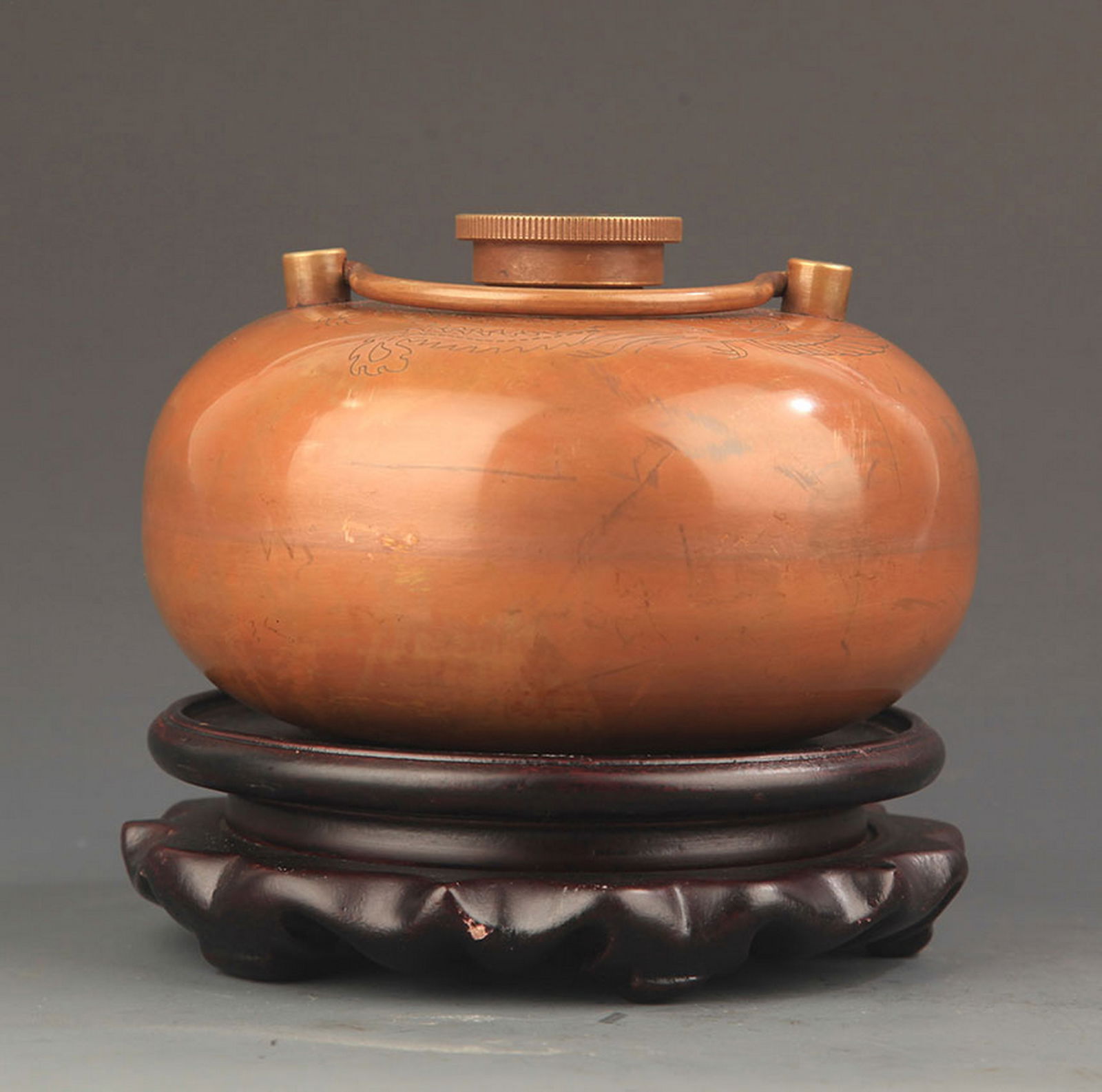 A FINE BRASS MADE HAND WARMER: Modern; High: 3.25 inch; High: 4.5 inch;