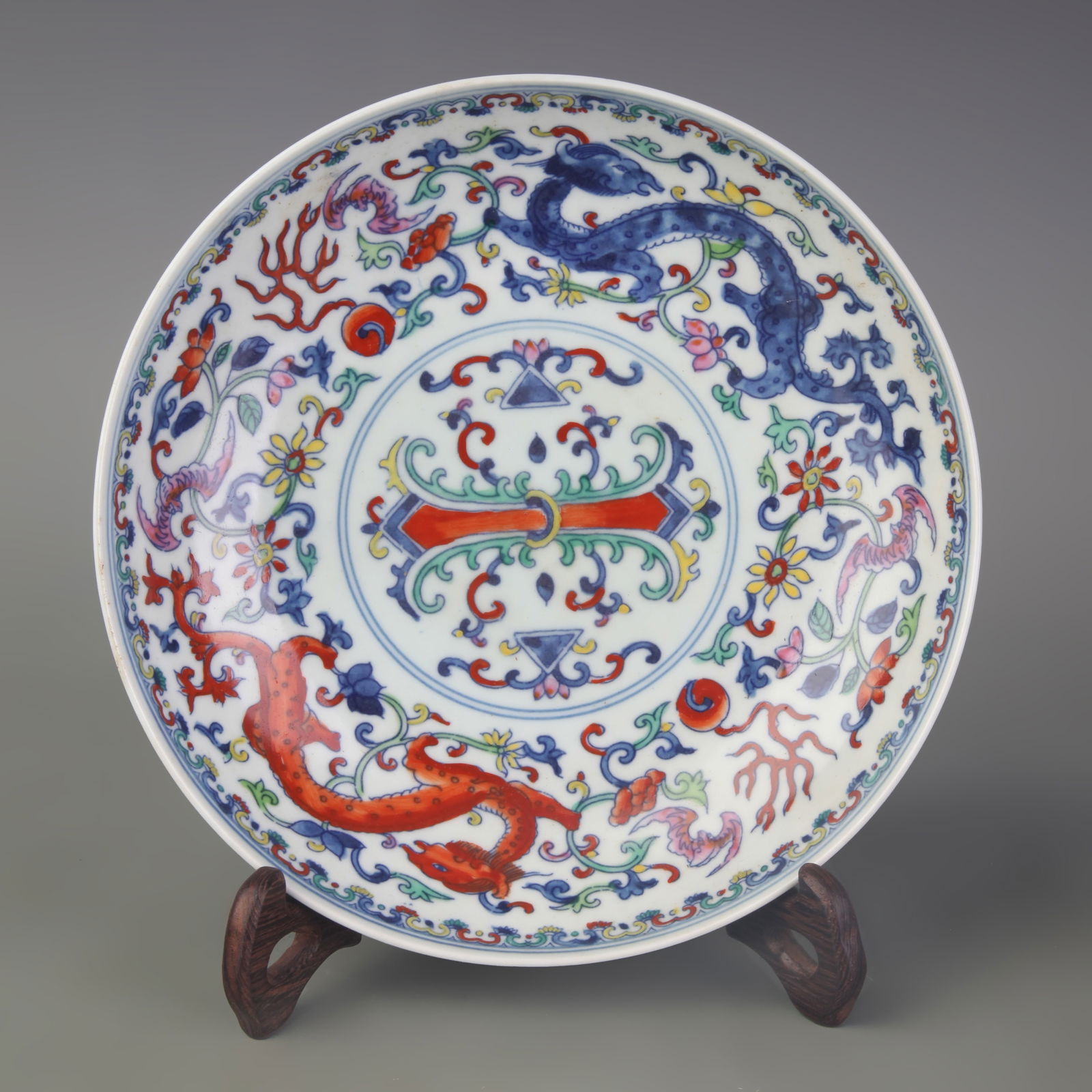 DOUCAI COLOR PORCELAIN DRAGON PATTERN PLATE: Qing Dynasty Yong Zheng Period; Diameter: 7.8 inch