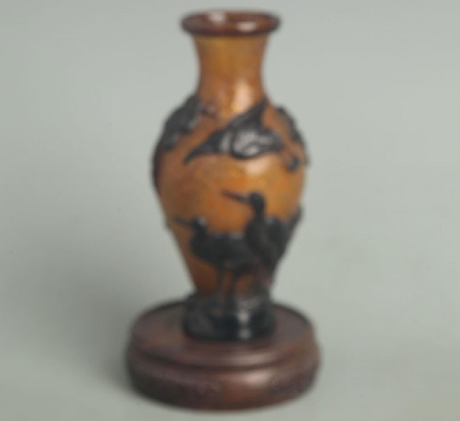 A FINE AMBER COLOR CRANE FIGURE GLASS BOTTLE: Republic Period, High: 6.00 inch; Width: 3.00 inch;