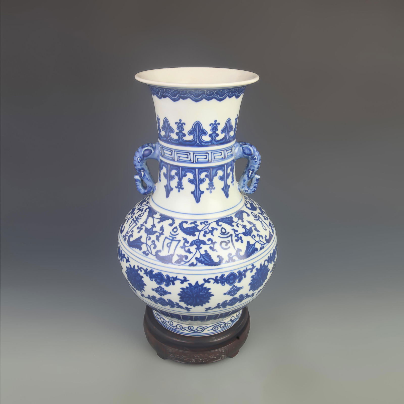 BLUE AND WHITE PORCELAIN VASE WITH ELEPHANT-SHAPED EARS: Qing Dynasty Qian Long Period; High: 14.0 inch; Diameter: 8.80 inch;