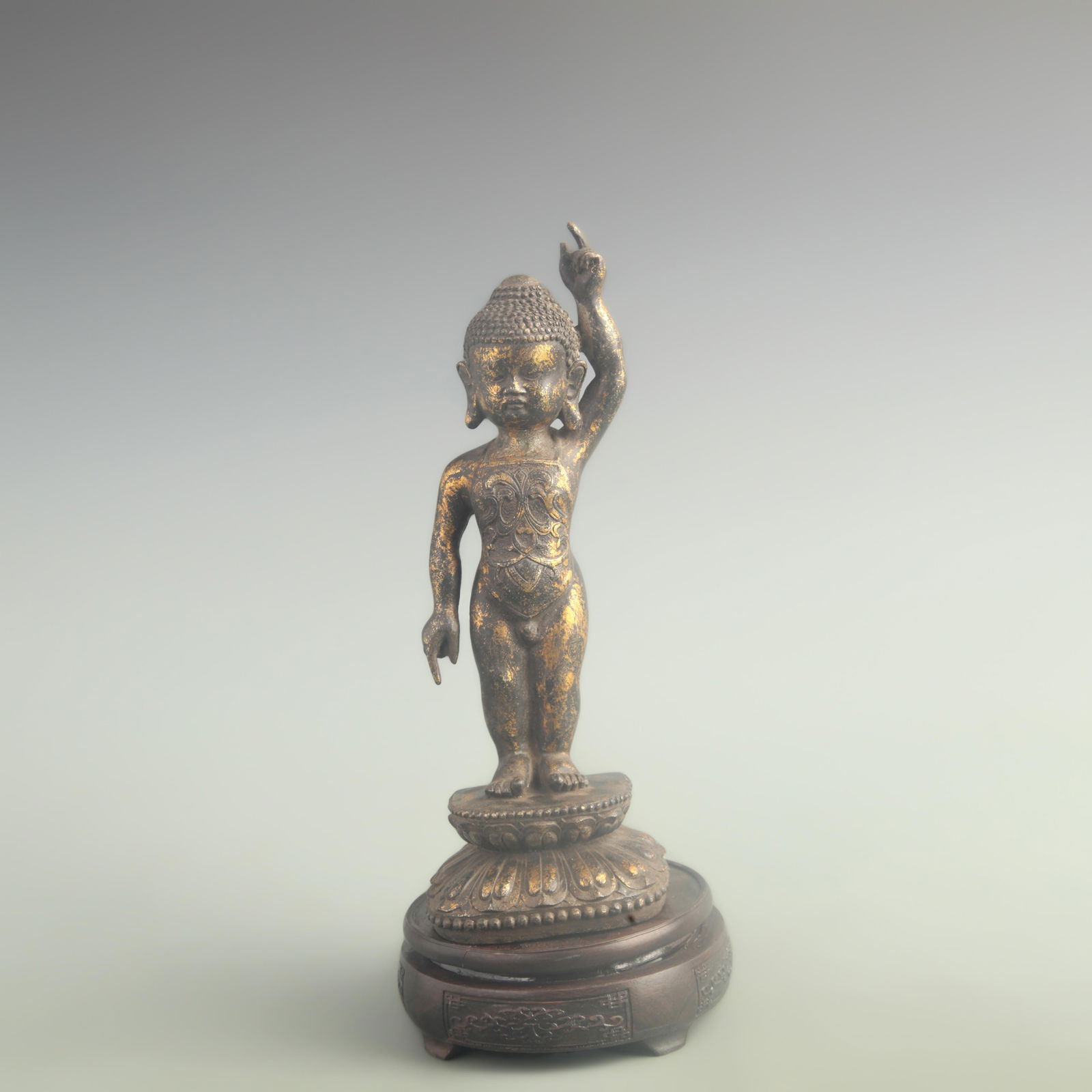 GILDED BRONZE GAUTAMA SIDDHARTHA STATUE: 19th Century; High: 11.0 inch; Width: 2.60 inch; Long: 3.80 inch