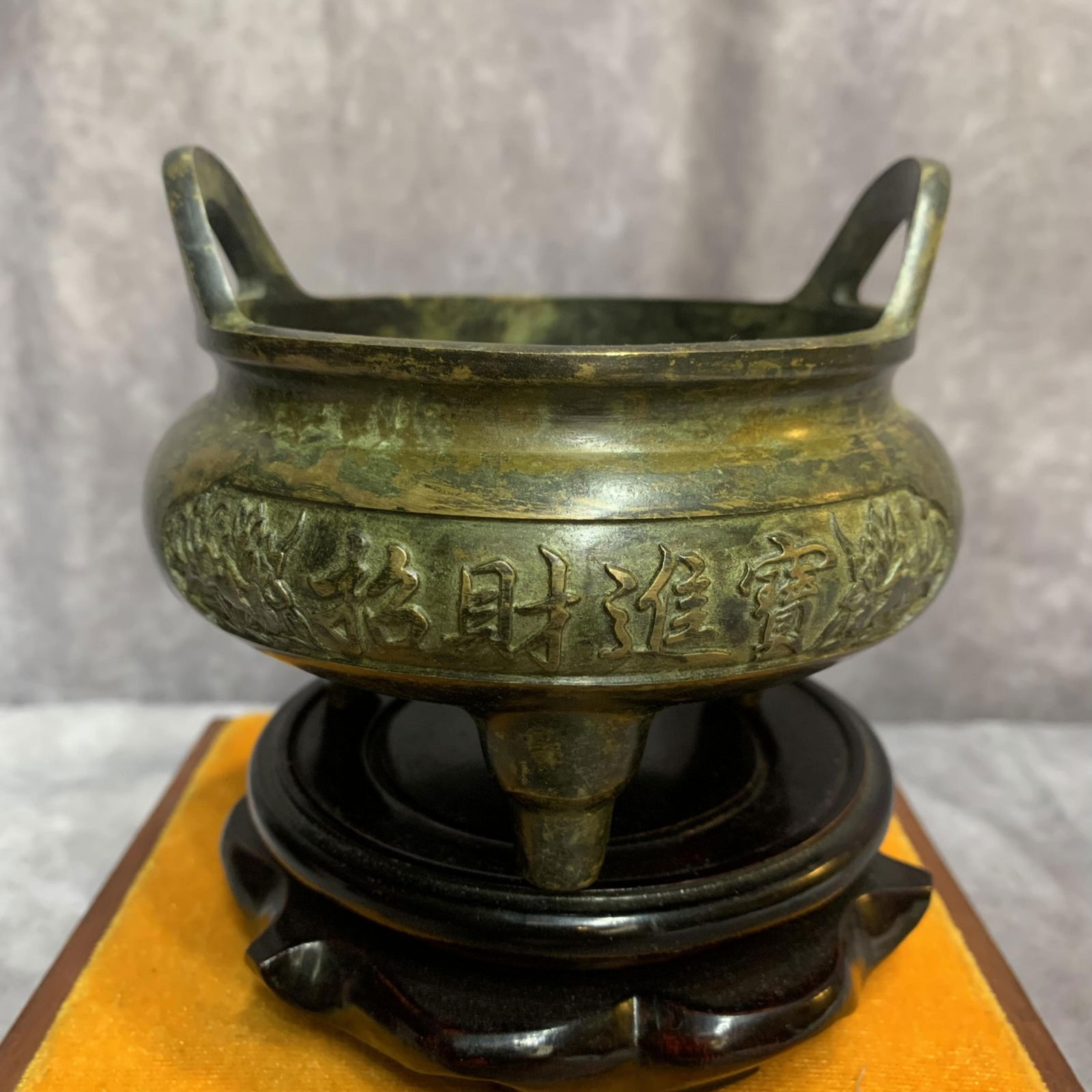 A FINELY CARVED THREE FOOT BRONZE CENSER: 19th Century; High: 3.7 inch; Diameter: 4.6 inch