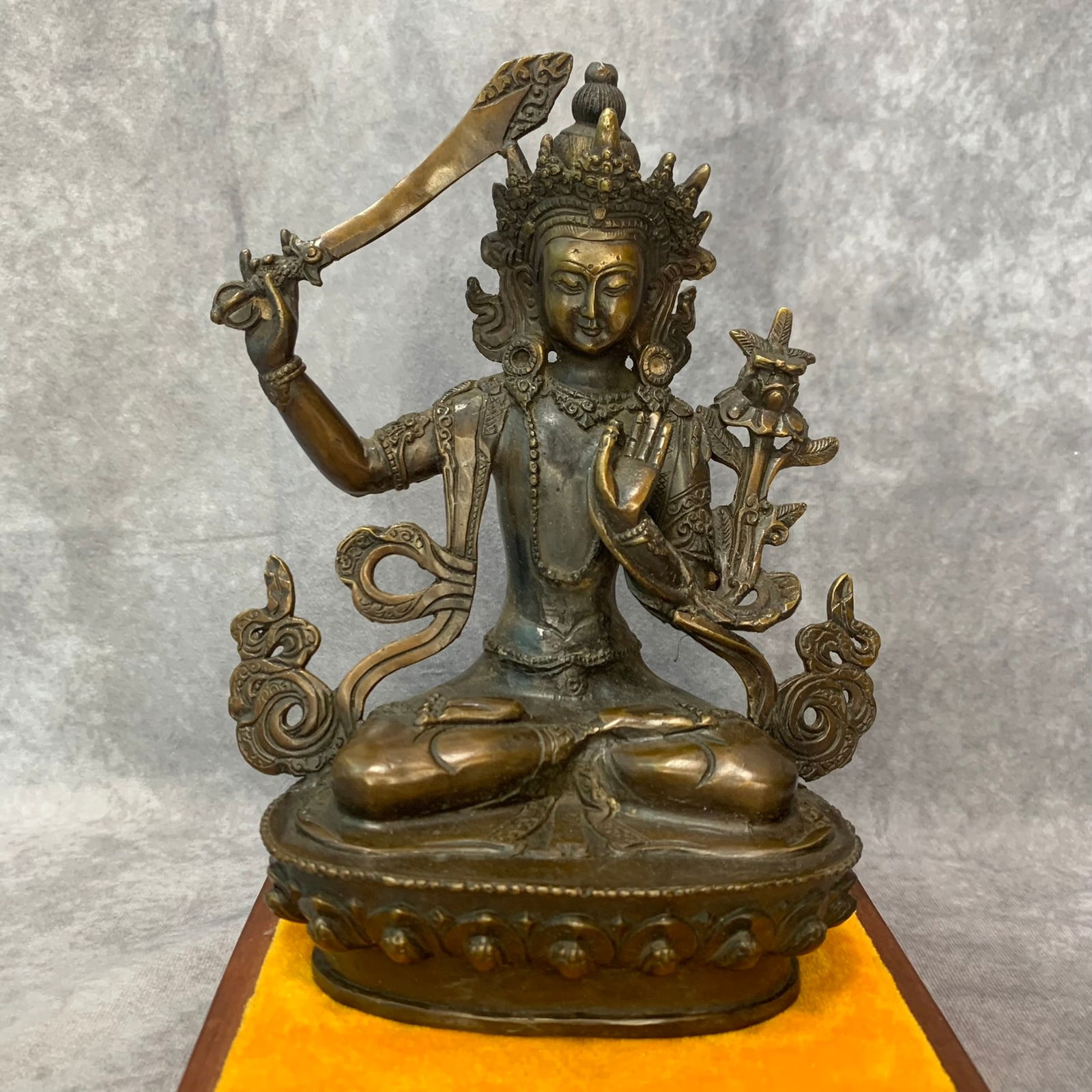 A FINE BRONZE MANJUSRI BUDDHA STATUE: Modern; High: 8.0 inch Width: 6.2 inch Long: 3.5 inch