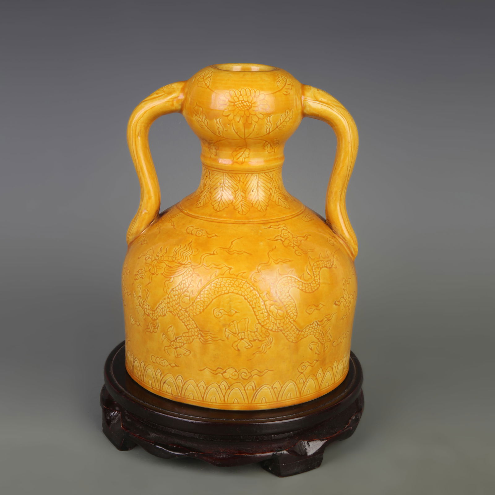 YELLOW-GLAZED CARVED DRAGON RUYI-HANDLE PORCELAIN ZUN VASE: Ming Dynasty Hong Zhi Period; Diameter: 6.3 inch; High: 7.8 inch