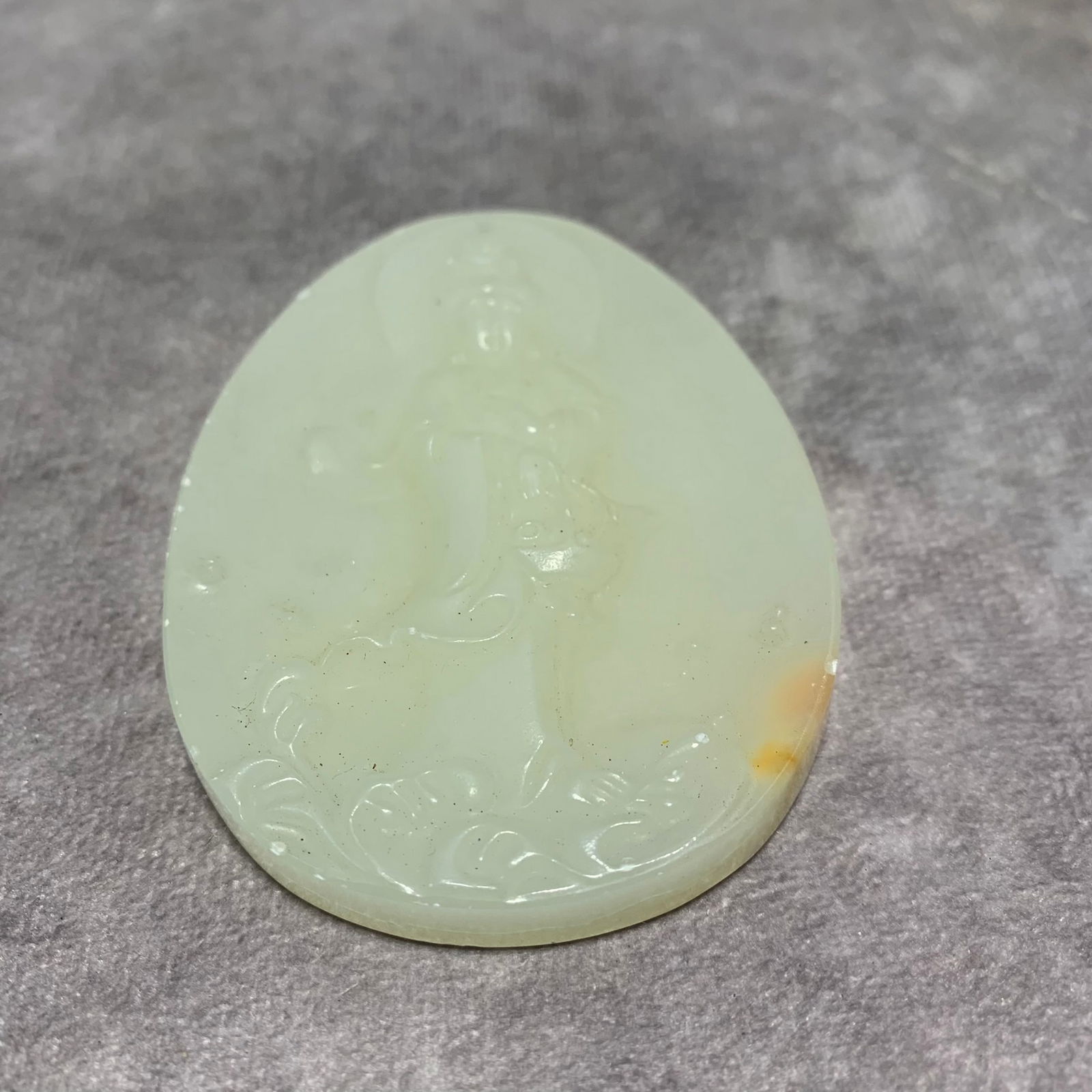 A FINE WHITE JADE GUANYIN PLAQUE: Modern; Long: 3 inch; Width: 2.3 inch; High; 0.4 inch;