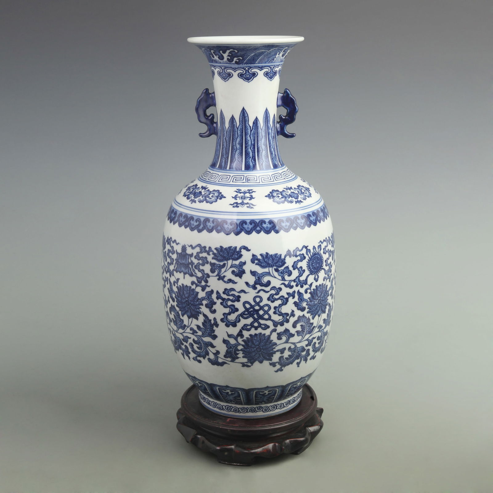 BLUE AND WHITE LOTUS SCROLL DOUBLE-EARED PORCELAIN VASE: Ming Dynasty Style; High: 17 inch; Width: 7.0 inch;