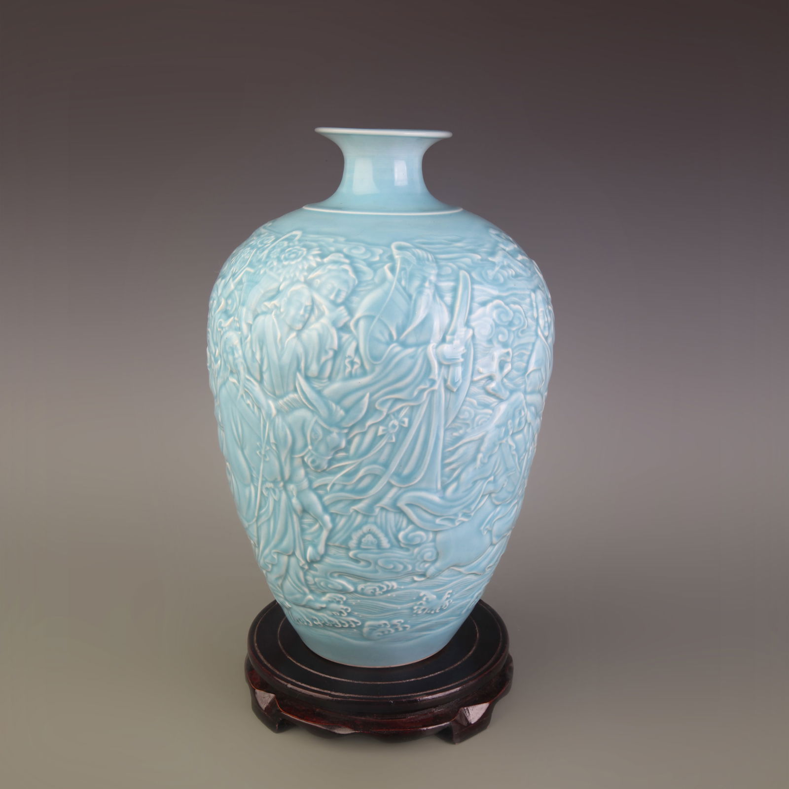 POWDER-GREEN GLAZE PLUM VASE WITH CARVED FIGURES: Qing Dynasty Qian Long Period; Diameter: 3.8 inch; High: 12.5 inch