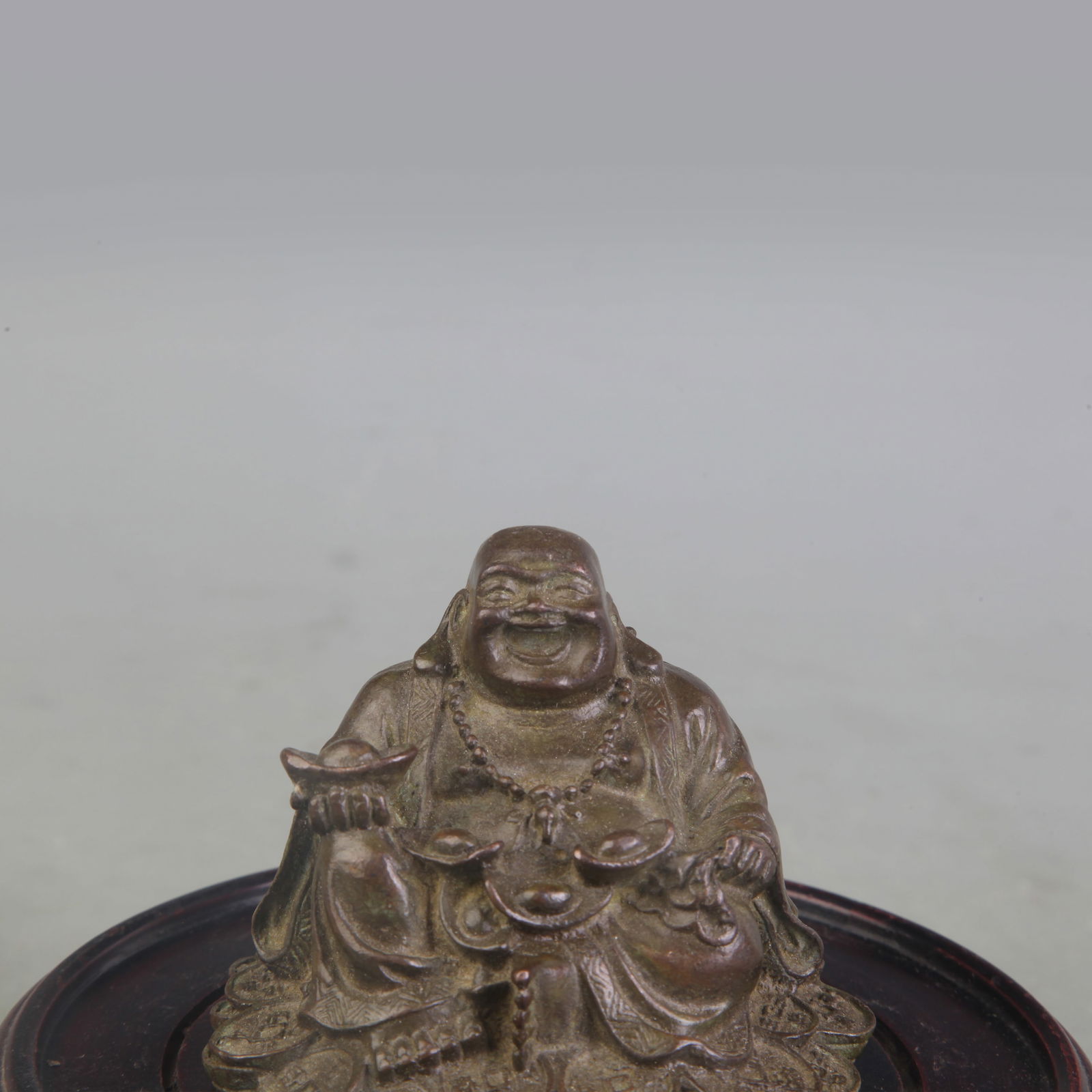 A SMALL MAITREYA BUDDHA STATUE - 2