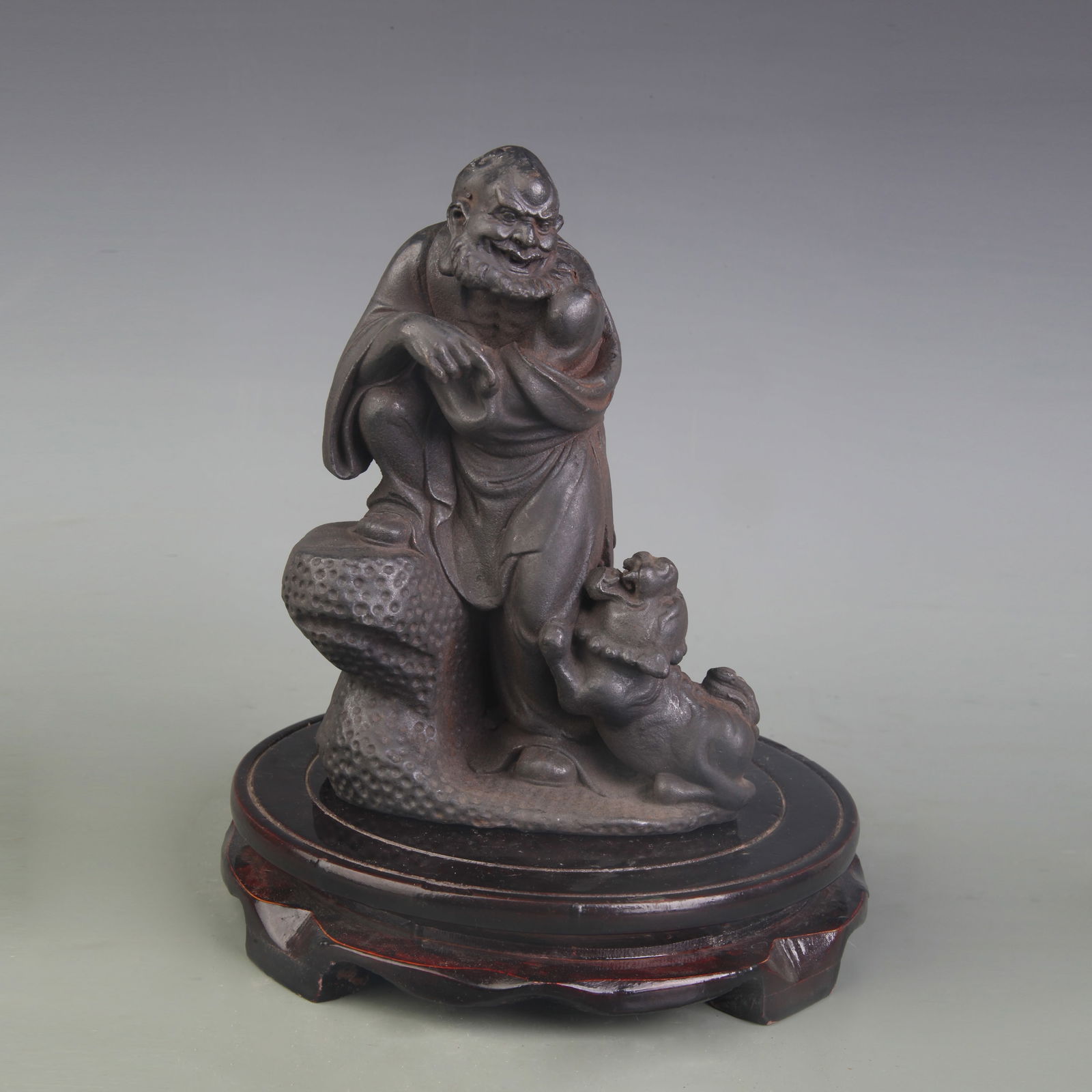 A FINE CAST IRON ARHAT (LUOHAN) FIGURE: Qing Dynasty; Width: 4.8 inch; High: 6.6 inch