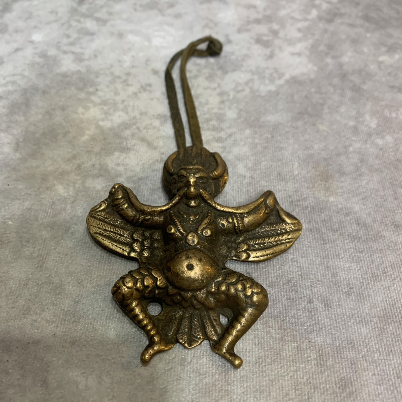 A FINE BRONZE STATUE OF A GARUDA PENDANT: Modern; High: 3.8 inch; Width: 3.4 inch
