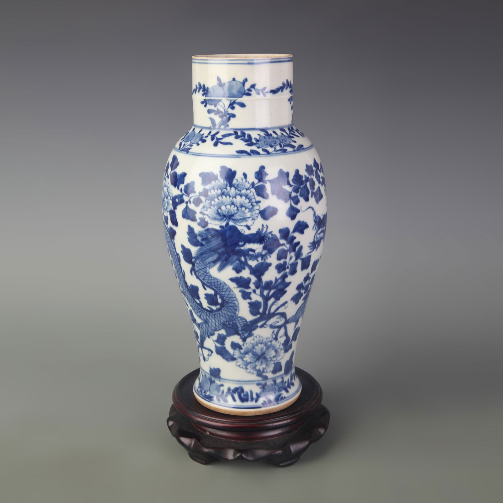 BLUE AND WHITE DRAGON PATTERN PORCELAIN VASE WITH FLORAL DESIGN: Qing Dynasty; Diameter: 2.9 inch; High: 10.4 inch